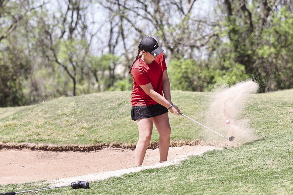North Rock Creek's Robyn Click gets out of the sand. She shot her personal best with an 85. Photo courtesy of Gowin Photography