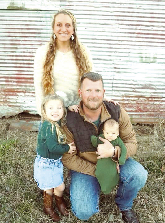 Bryce Clemons, above with his wife, daughter and son, was hired as the Shawnee High School head softball coach for the 2024-2025 school year. Photo provided by Shawnee Public Schools
