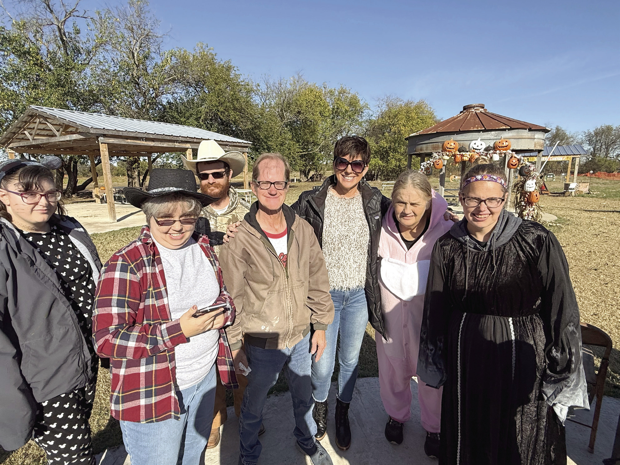 South Central Industries CEO Tina Hanna (third from right), poses with some of her PEEPs, or clients, during a recent event. Photo provided