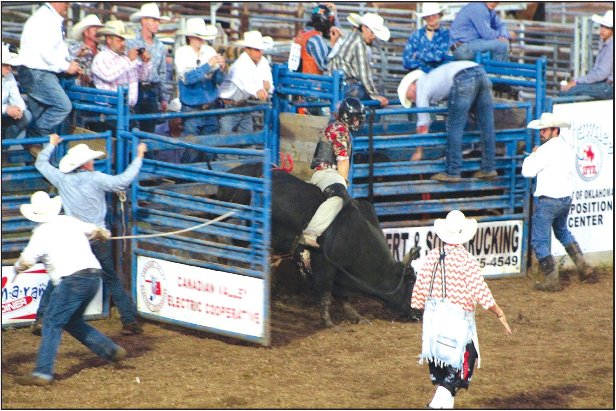Brayden Dowdle of McLoud competes in the second round of bull riding at the IFYR on July 12. Countywide & Sun/Natasha Dunagan