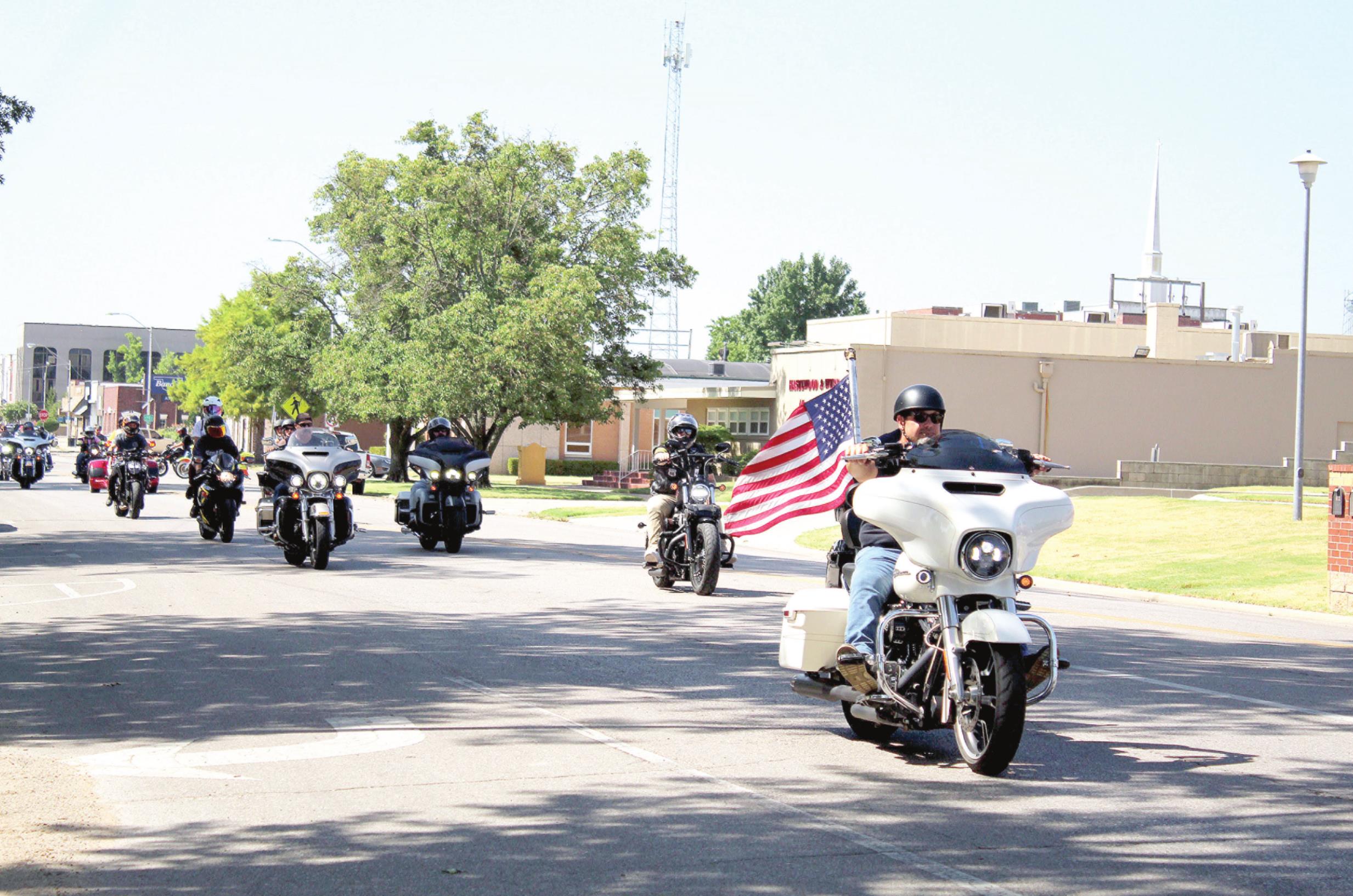 Participants in the Sixth Justin Terney Memorial Poker Run drive north on Broadway Ave., on July 23, leaving from the Pottawatomie County Courthouse. About 78 motorcyclists and three vehicle drivers participated in the event. Countywide & Sun/Natasha Dunagan