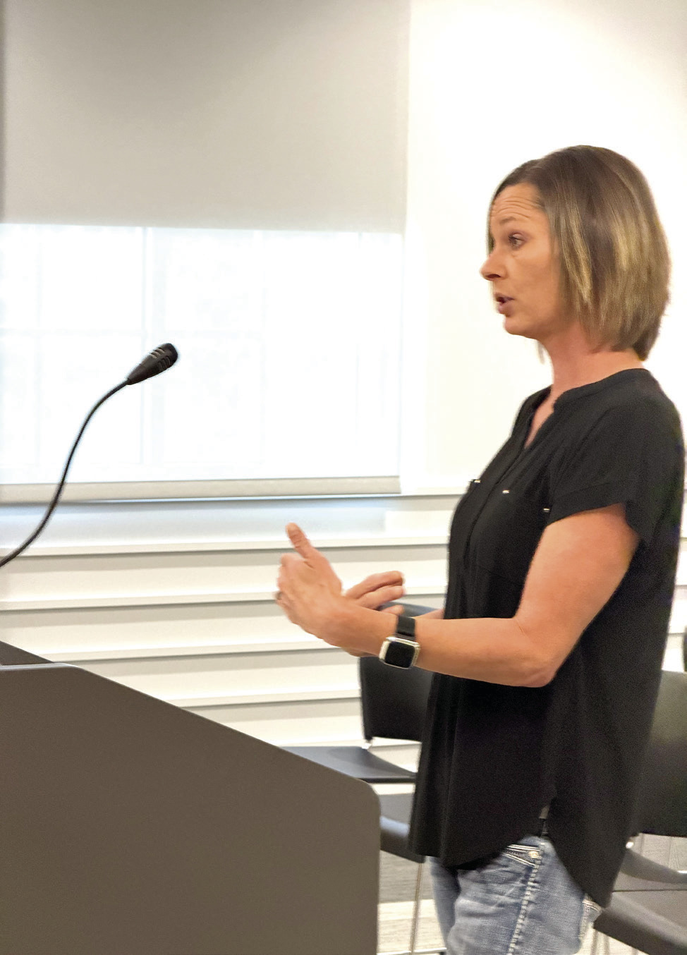 Resident Cara Kinnamon addresses the Board of County Commissioners. Suzie Campbell, Countywide &amp; Sun
