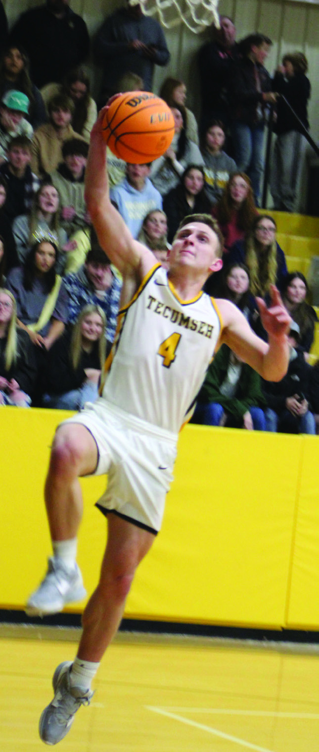 After stealing the ball, Tecumseh senior Brady Overstreet makes two points in the last minute- and-a-half of the homecoming game against Bethel on Feb. 3. One minute later, his teammate Jace Edwards made anothe r basket. The Savages lost, 61- 70. Countywide &amp; Sun/Natasha Dunagan