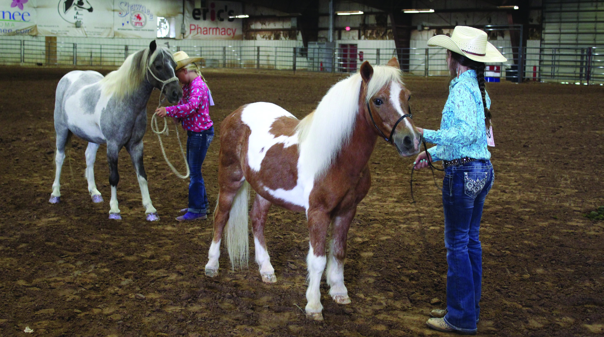Marena Wilson and Keelie Utter show their Small Ponies in the Pottawatomie County Horse Show at the Free Fair on Sept. 10. Wilson placed first, and Utter placed second in the class. Countywide &amp; Sun/Natasha Dunagan