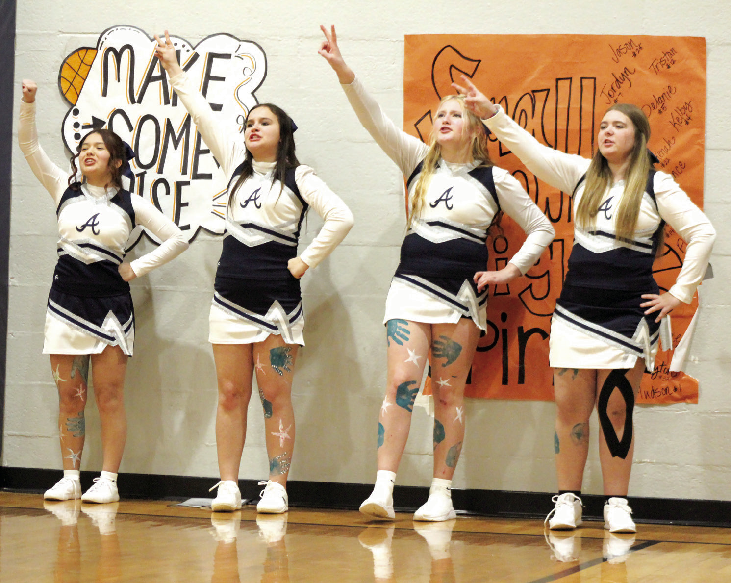 Asher High School’s four varsity cheerleaders rally the Indians during the home games on Jan. 12. This is the first year for Asher to restart their cheerleading program. Shown, from left, are Cristi Tubbesing, Tianndra Reddin, Laci Whittle and Chloee Dobbs. Countywide & Sun/Natasha Dunagan