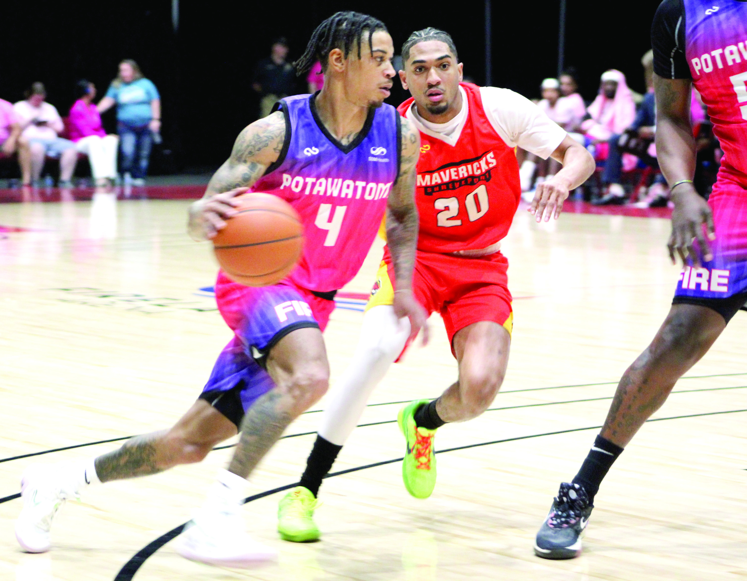 The Potawatomi Fire’s Chuck Guy drives to the basket during the Pink Out for Cancer and “Shawnee Strong” for disaster relief game with the Shreveport Mavericks on April 21. Guy led the Fire with 29 points, 13 rebounds, and six assists in the game, which was won by the Fire, 122-103, according to their Facebook page. Countywide &amp; Sun/Natasha Dunagan