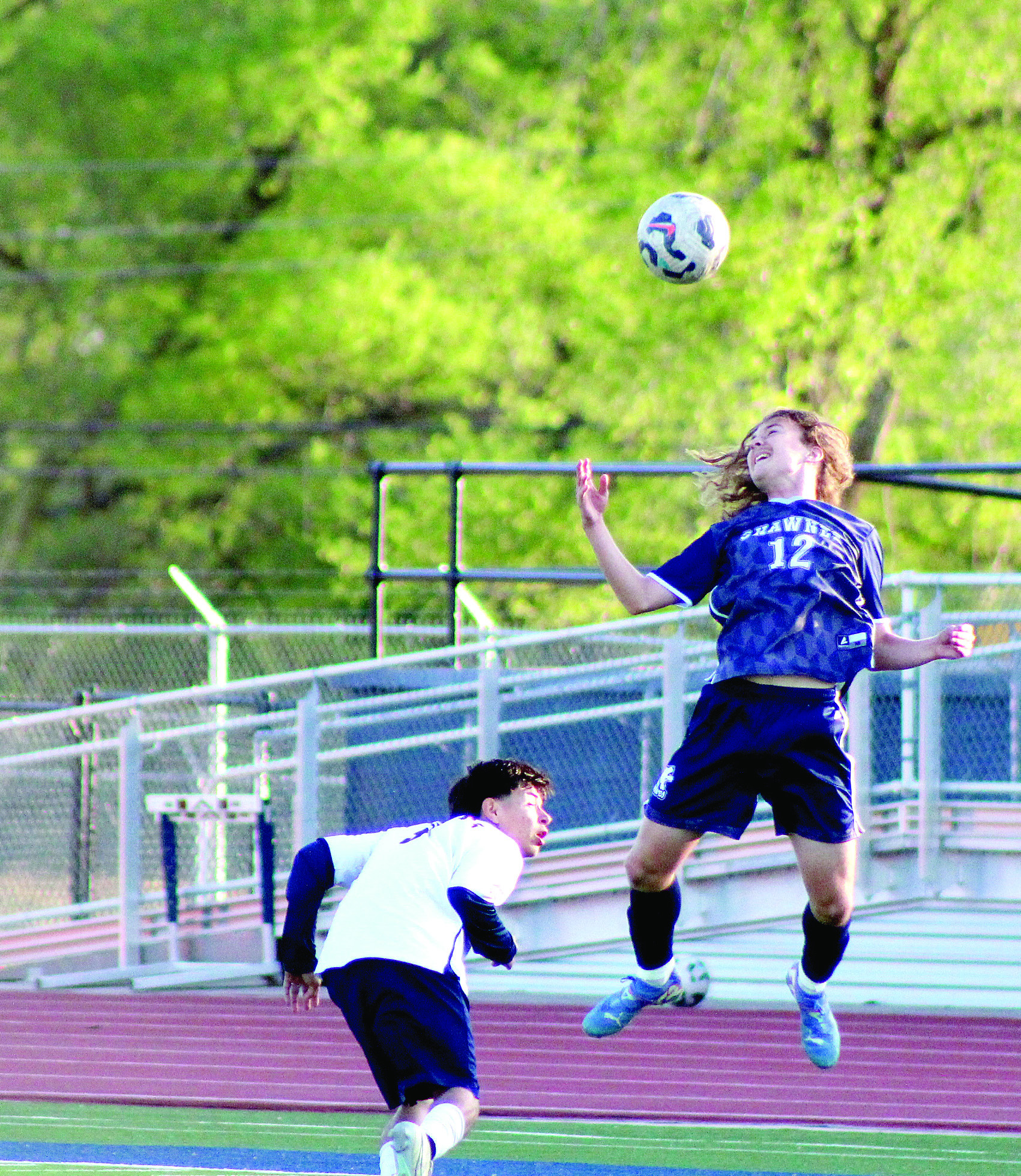 Shawnee sophomore Jax Martin keeps the ball in play with a header during the Apr. 8 home game with Nathan Hale. The Wolves won, 2-0. Natasha Dunagan, Countywide & Sun