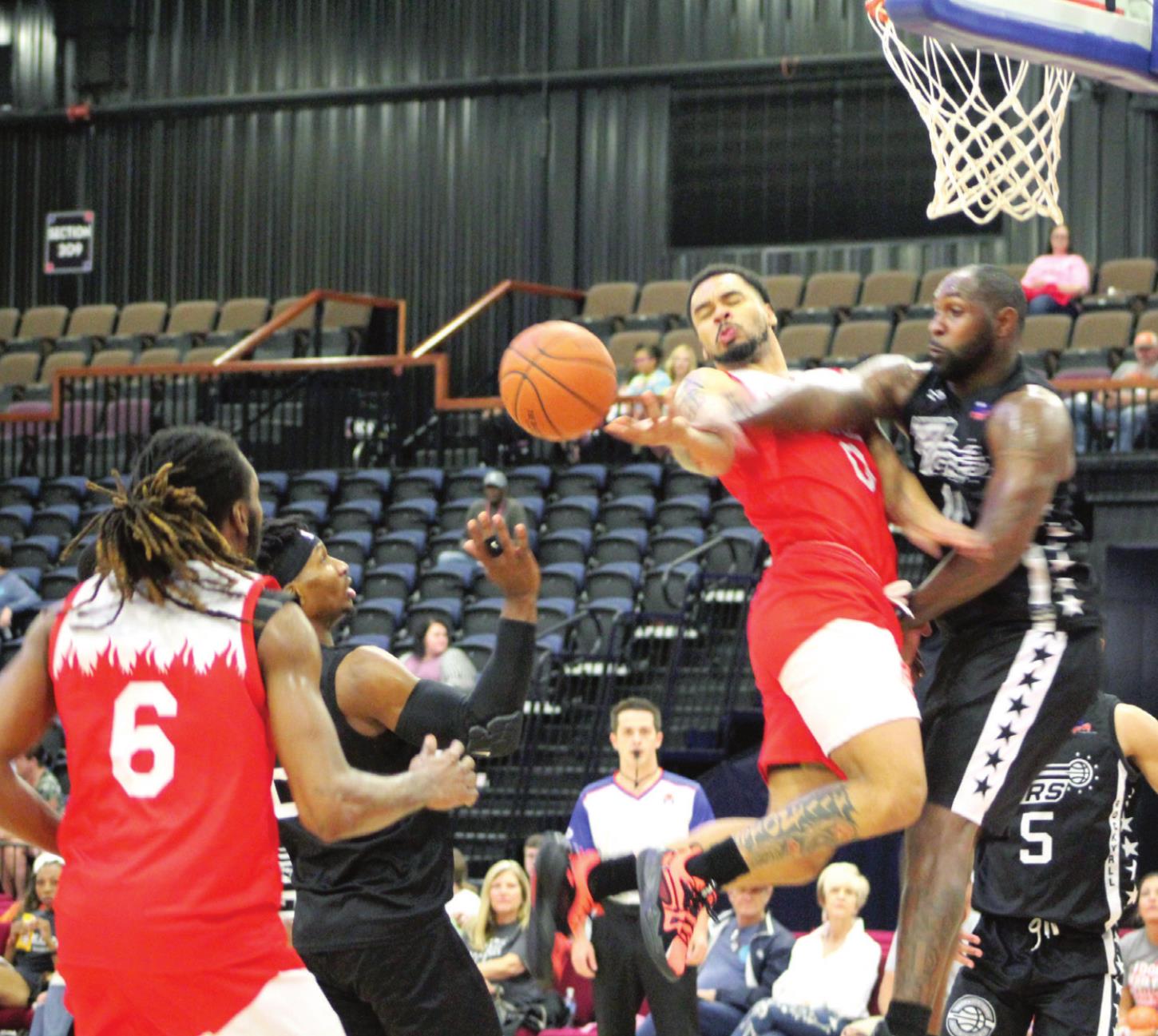 Potawatomi Fire Point Guard DeShawn Munson (#0) passes the ball to Center Anthony Allen (#6) during the third quarter of the home game against the Rockwall 7ers on May 6 at FireLake Arena. The Fire won 124-116. For more information, visit their website at potawatomifire.com.