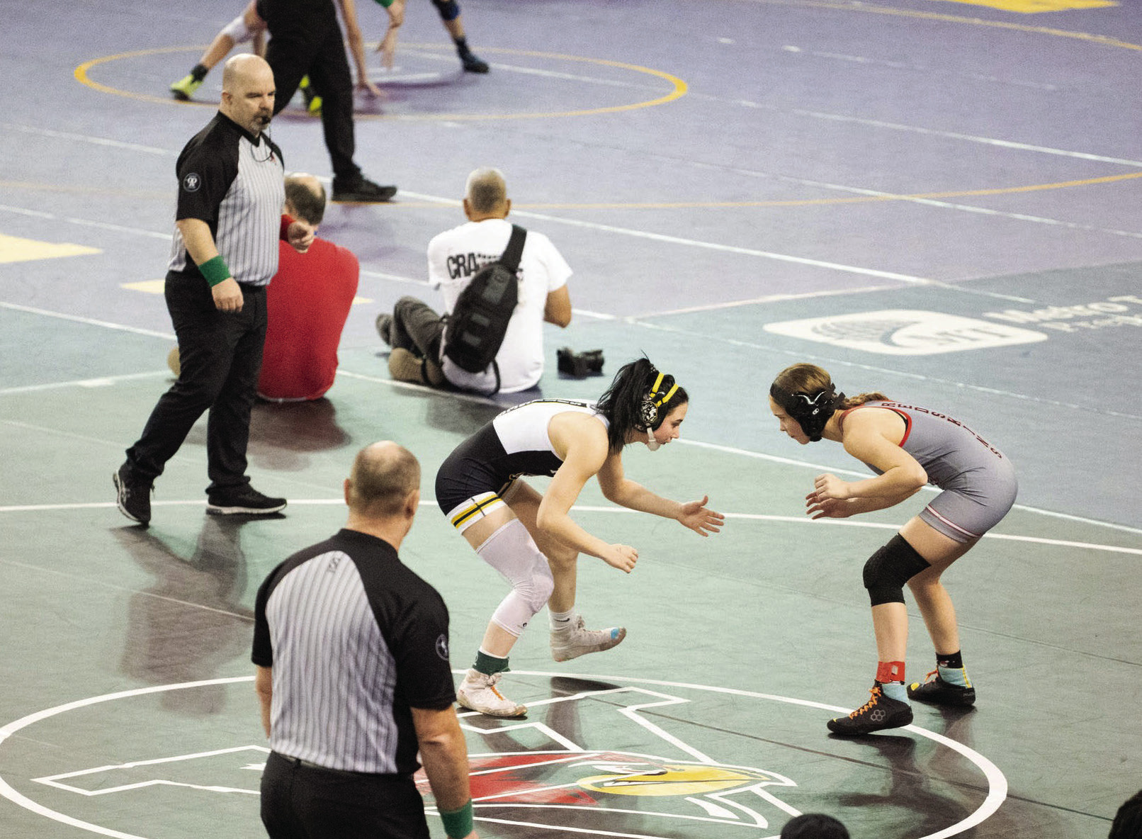 Tecumseh’s Vivian Hayes sizes up her opponent from McLoud at the State Wrestling finals on Feb. 25. Photo provided by Kenetta Lisenbee.