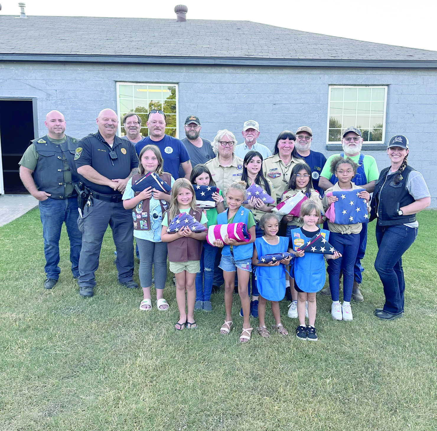 Members of the American Legion, Post 244 and the Cub Scout Troop 477, both in McLoud. The two organizations held a Flag Retirement Ceremony. A member of the American Legion said there were so many flags received that it was impossible to retire all of them in one evening. We will watch for another ceremony to be held in the near future. Photos provided by Monica Poindexter