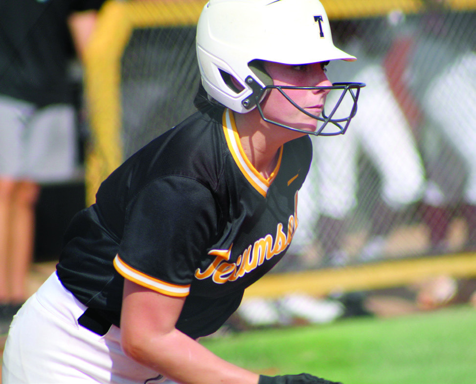 Tecumseh’s Bristin Hayes runs after hitting a single in the first inning of the game against Blanchard on Aug. 8. Hayes was the only one to cross home base that day. The first Tecumseh fastpitch home game of the season took a break for lightning after the second inning and was eventually rained out. Countywide &amp; Sun/ Natasha Dunagan