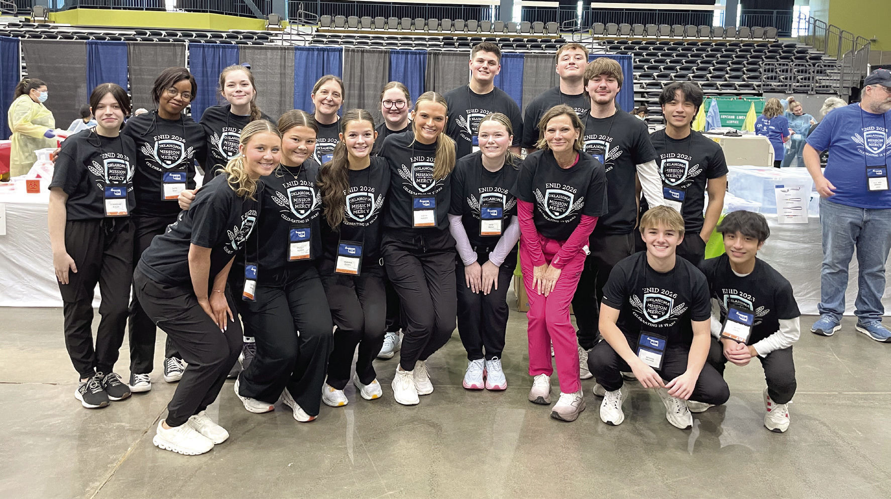 North Rock Creek High School students, along with sponsors, Kristin Grimes, Spanish teacher, and Brandy Smith, Biological Science and Health Careers Teacher stop for a group photo after volunteering at the OkMOM event held in Enid this year. Photo Provided