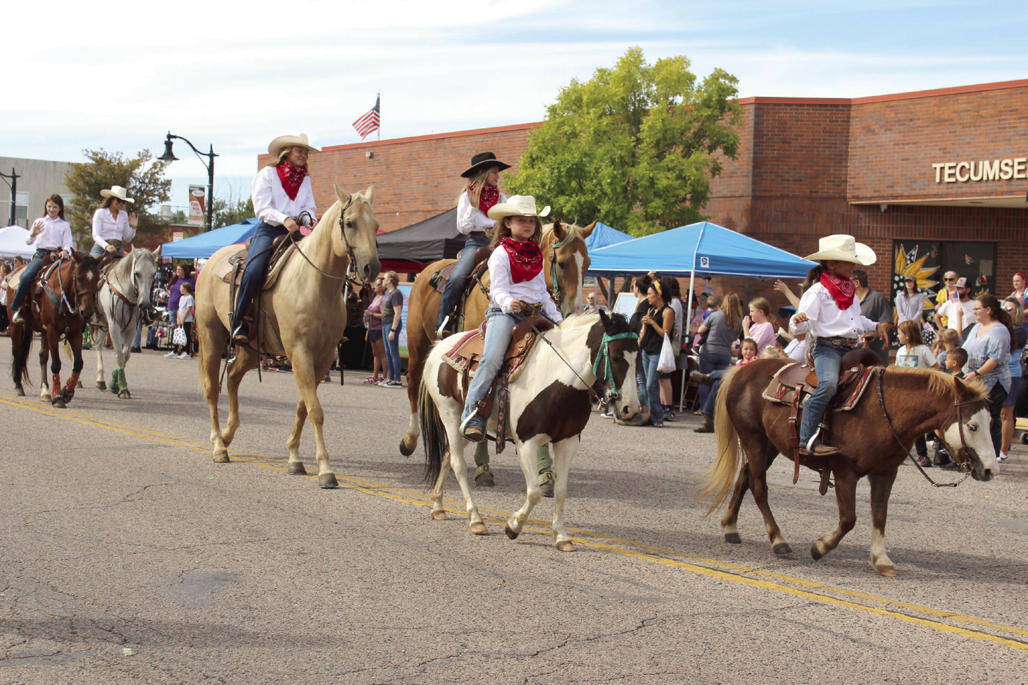Members of the Tecumseh Round-Up Club ride their horses in the Frontier Days Parade on Sept. 28, 2024. They won second in the Club/ Organization category, and they held a rodeo that evening. File Photo