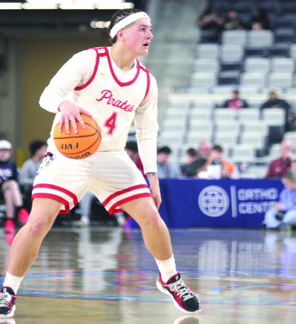 Dale senior Wyatt Seeley looks for an opening to pass during the Class 2A State Quarterfinal game against Vanoss on March 12. It was during this game that Seeley achieved his 1,000th career point. Natasha Dunagan, Countywide &amp; Sun