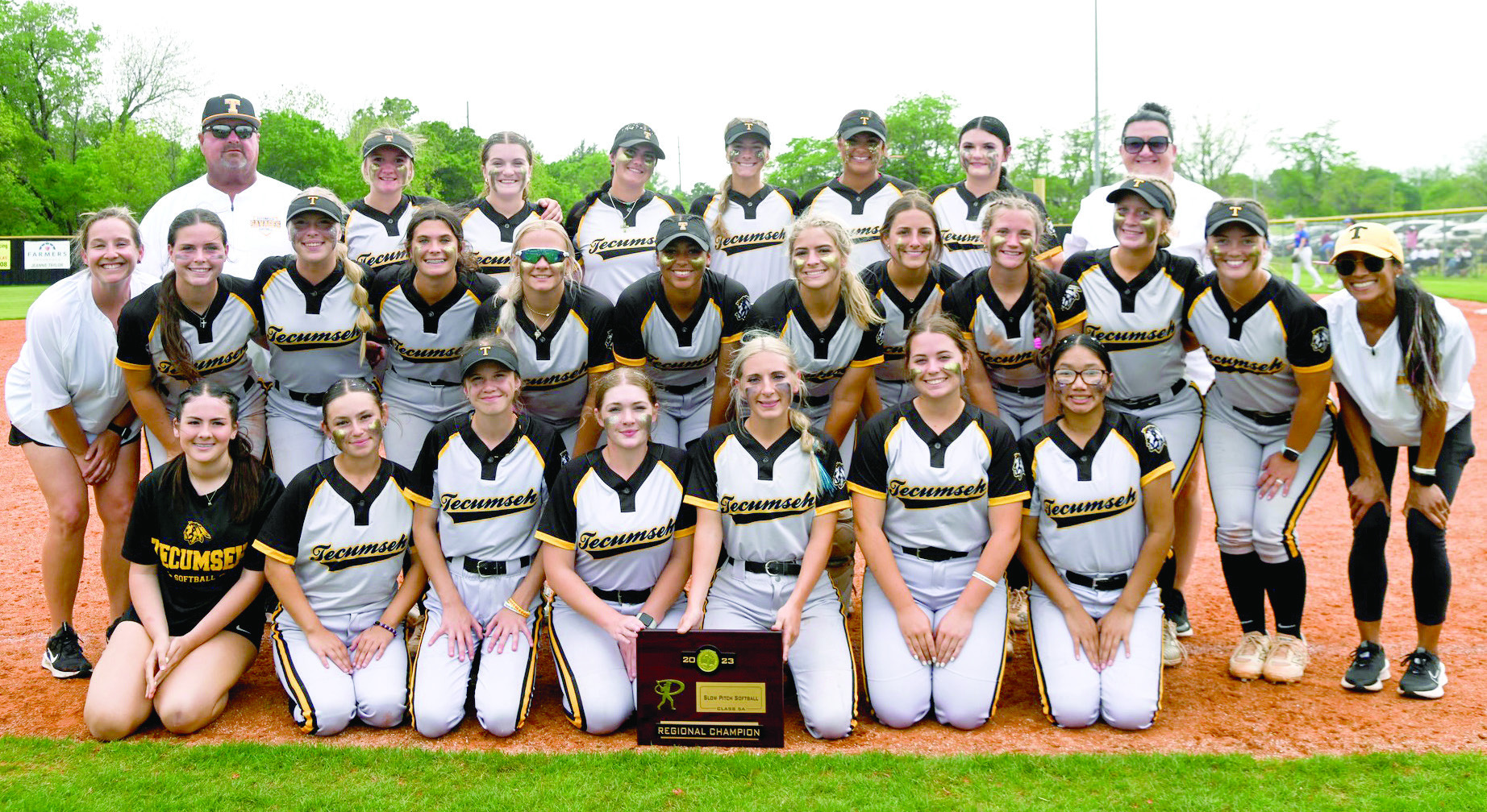 The Tecumseh Lady Savages Slow Pitch Team pose with their coaches Perry Wilson and Kayla Rodriguez after winning the Class 5A Regional Championship. Playing at home, they beat Purcell, 5-1, and Bethel, 6-3. Tecumseh will play in the State Tournament today (May 8) against McLoud at 10 am. If they win, the semifinals will be at 4 pm, and the finals will be at 7 pm. Photo courtesy of Kenetta Lisenbee