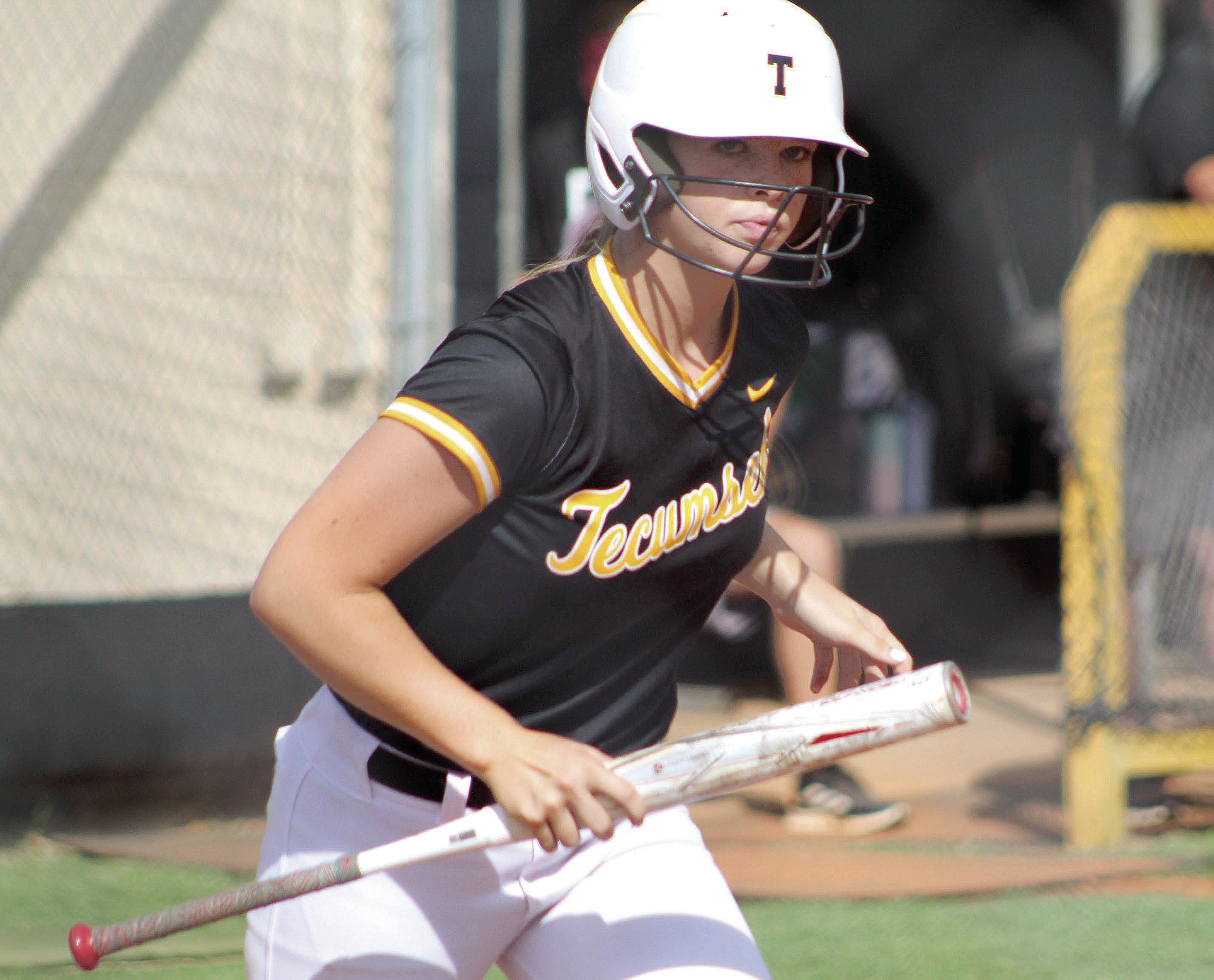 Tecumseh’s Katelyn Fleming puts her bat down after getting the walk during the home game against Blanchard on Aug. 8. Countywide &amp; Sun/Natasha Dunagan
