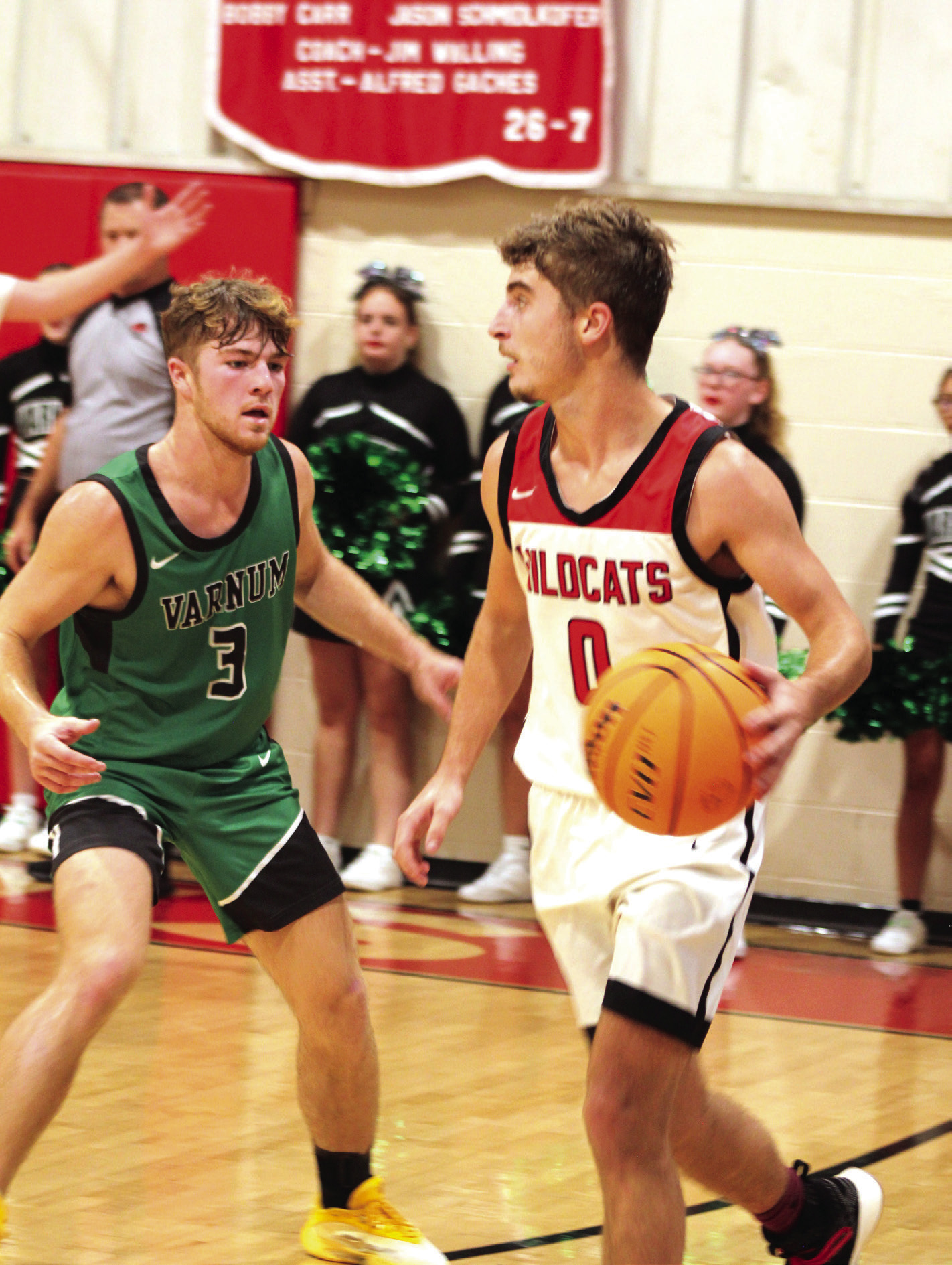 Earlsboro's Brayden Rawls looks for an opening to pass during the first quarter of the Nov. 7 home game against Varnum. The Wildcats lost 35-53.