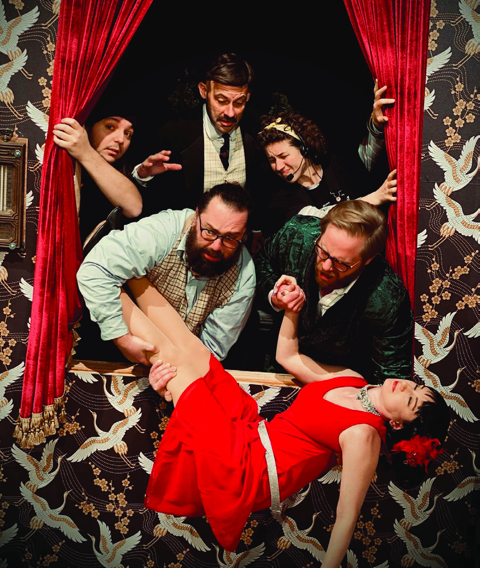 Getting an unconscious body offstage causes problems in SLT’s “The Play That Goes Wrong”. Left to right from the top are Tanner Rippee, George Wright and Elizabeth Sidler. On the front row is Eric Strimple, Jill Fry and Tom Dahlman. Photo provided