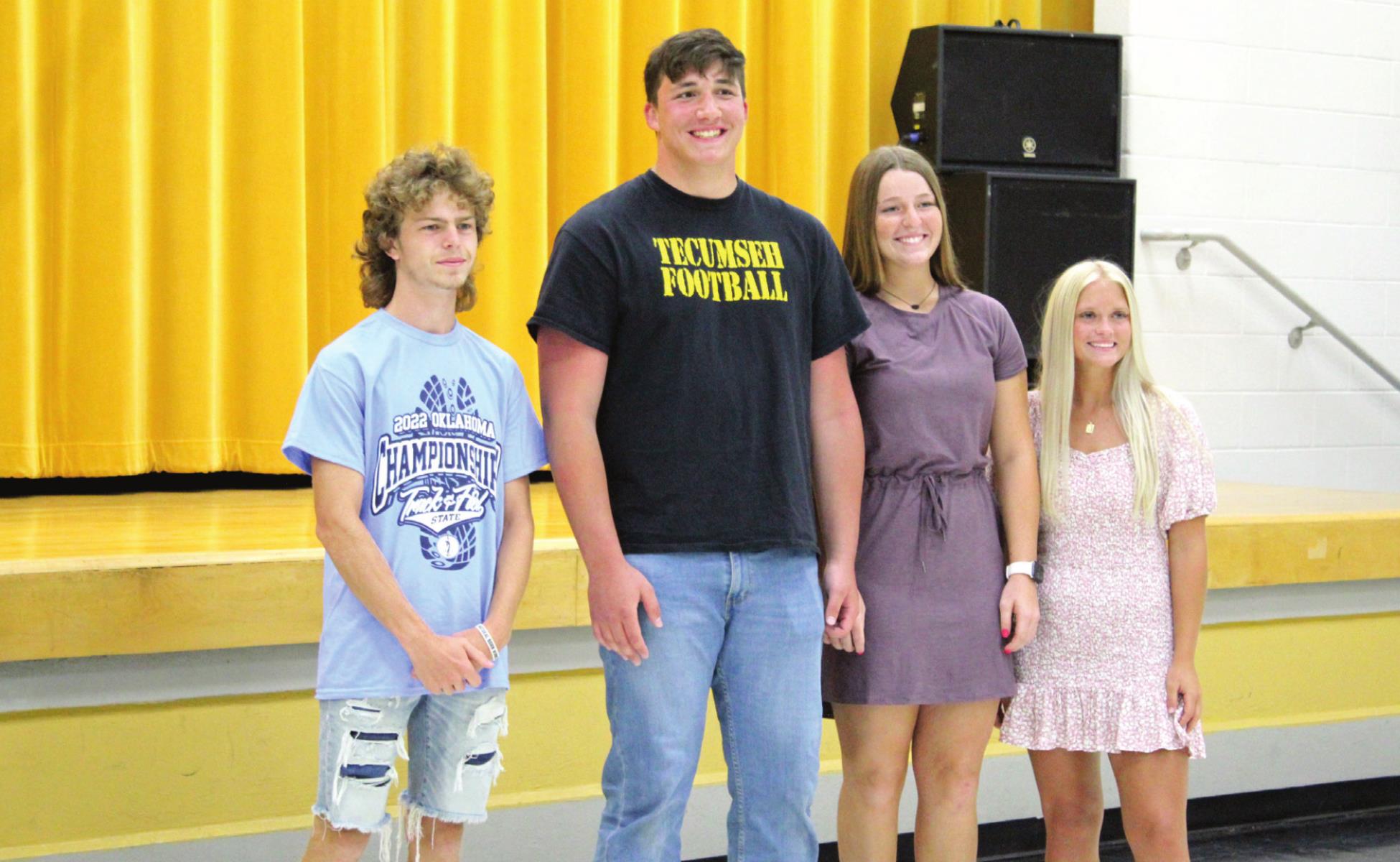 Four athletes from Tecumseh High School achieved All-State status this school year and were recognized during the THS Athletic Awards on May 16. They are Hayden McClure, in track; Brennon Carter, in football; Emily Bingham and Lauren Taylor, both in softball. Countywide &amp; Sun/Natasha Dunagan