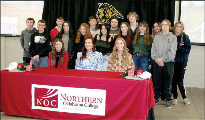 Tecumseh seniors Jocelyn Phelps, seated far left, and Marli Williams, seated far right, signed a letter of intent for livestock judging at Northern Oklahoma College on Jan. 20. FFA Advisor and agriculture teacher Dodge Nichols said this is the first livestock judging signing in the 10 years he has been at Tecumseh High School. Also shown, seated center, is Northern Oklahoma Livestock Judging Coach and Professor Jennifer Bedwell and, standing, the THS FFA Livestock Judging Team. Countywide & Sun/Natasha D