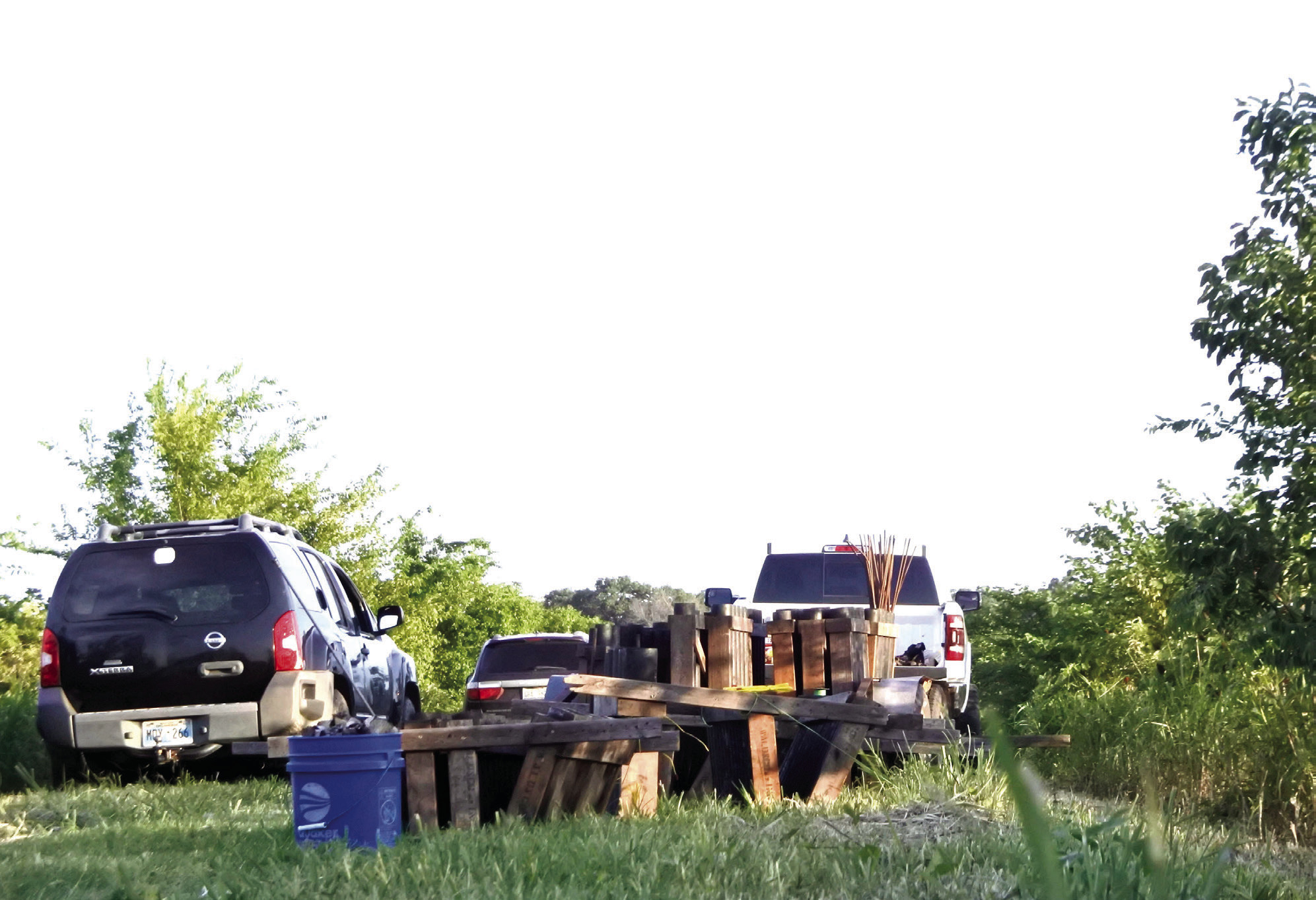 Hours before folks began to arrive for the show, Tracy Climer and his crew (primarily made up of his wife, son, and daughter-inlaw) begin unloading the gear, securing the tubes and clearing any trash from inside each tube. Photos by Suzie Campbell, Countywide & Sun