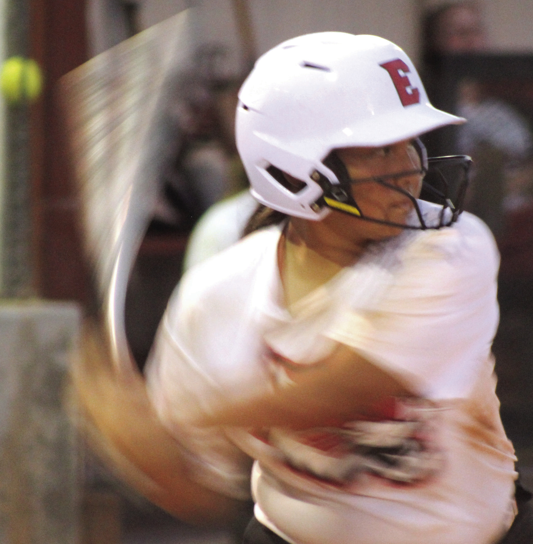 Earlsboro sophomore Izzy Lindsey takes a swing at bat during the Aug. 24 game at McLoud.