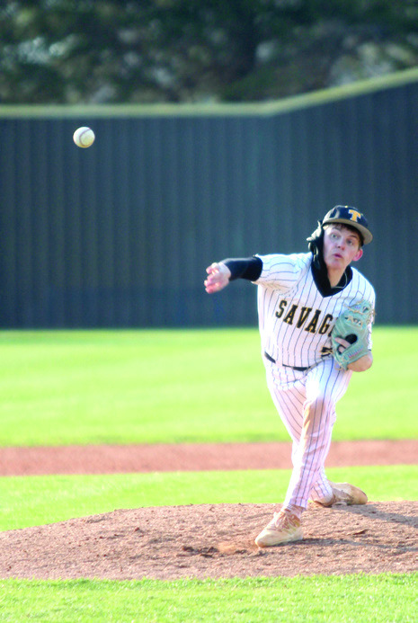 Tecumseh senior Lane Steward puts a spin on the ball during the March 25 home game with Blanchard. The Savages fell, 0-11. Natasha Dunagan, Countywide & Sun