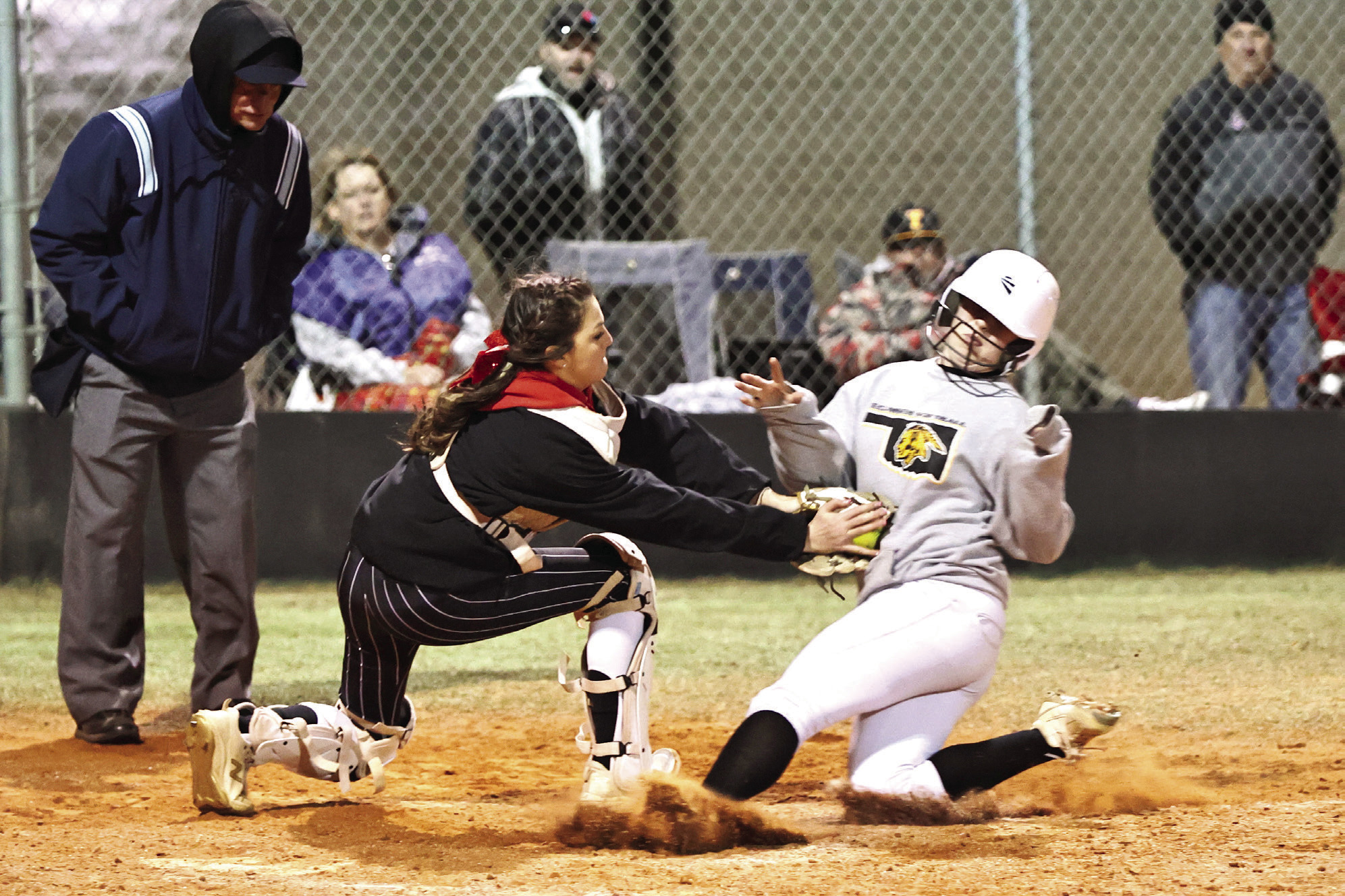 North Rock Creeks Amari Seidl makes the out at home to stop the tying run from happening. NRC came from behind to beat the Tecumseh Lady Savages 9-8. The Lady Cougars are 5-0 for the season. Photo courtesy of Gowin Photography