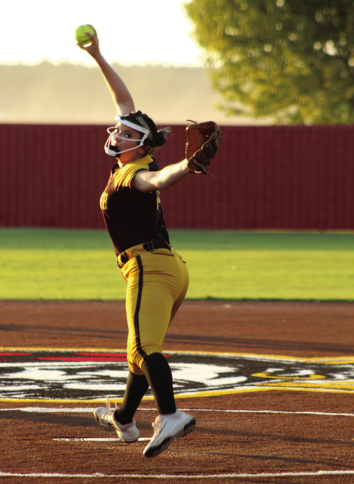 Tecumseh senior Jacee Townsend aims for home as she winds up and catches air during the Aug. 18 game at Dale. Photos by Natasha Dunagan, Countywide &amp; Sun