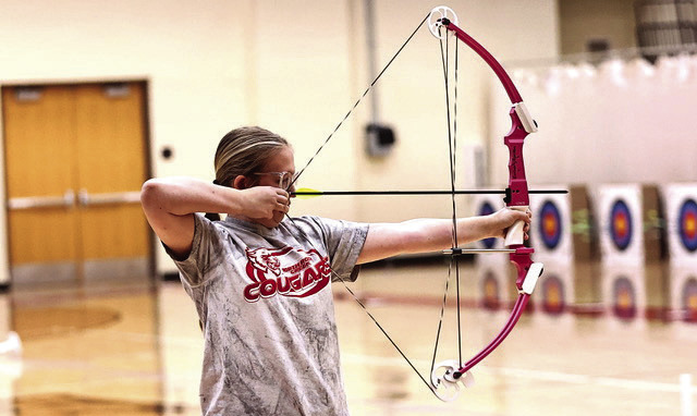 NRC Freshman Kimmy Bjorkley takes aim at the annual Veterans Weekend Shootout hosted at North Rock Creek Nov. 7-8. NRC High School and Middle School teams took first and the Elemenrary took second place. They are headed to Meeker's Annual Turkey Tournament, Nov. 14-15. Photo Courtesy of Gowin Photography