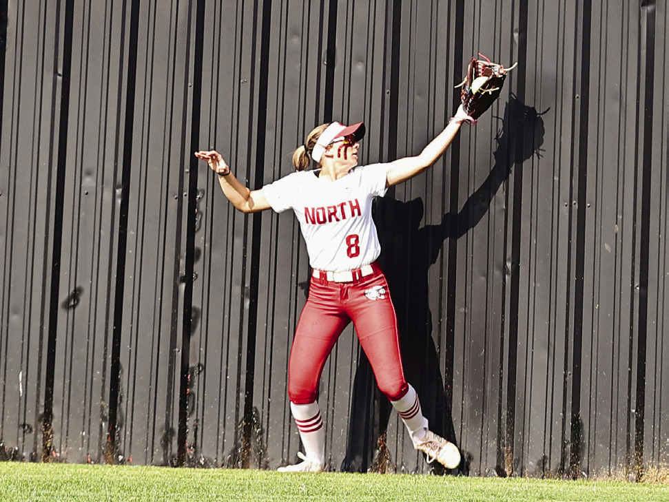 North Rock Creek's Aubree Shivelhood make a catch at the wall. Photo courtesy of Gowin Photography