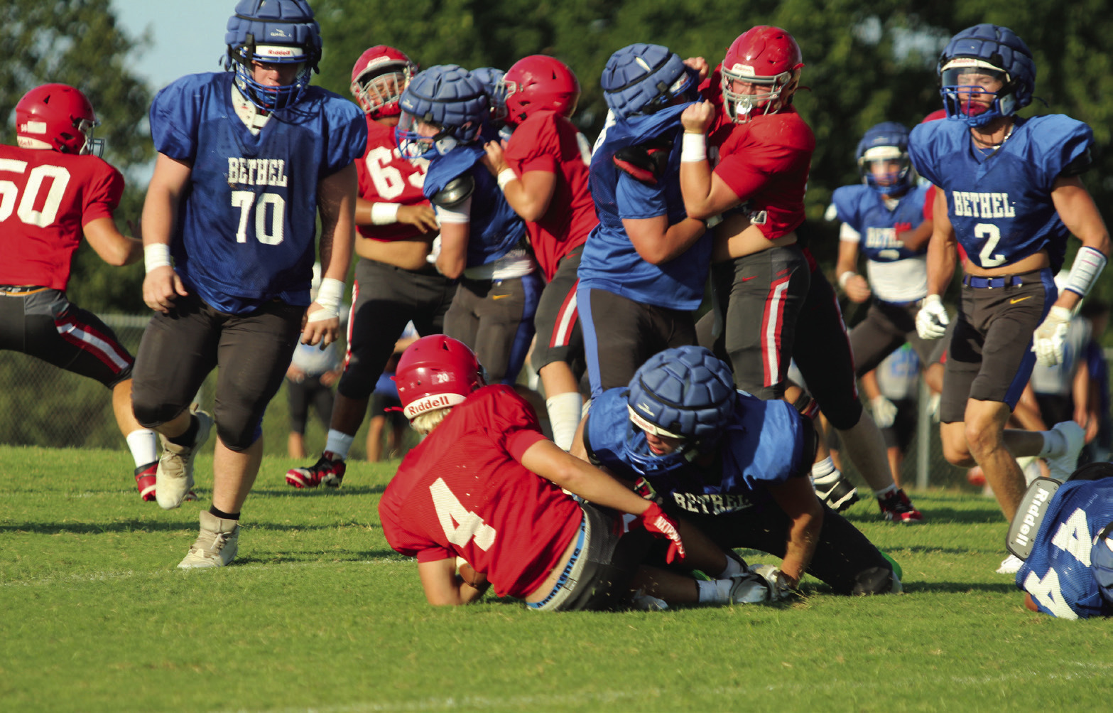 Bethel senior Luke Quinter tackles North Rock Creek's #4 in a scrimmage on Aug. 22. They also faced off against Bridge Creek. Bethel's first home game of the season is on Sept. 12 at 7 pm against McLoud, and North Rock Creek plays at home, after two away games, on Oct. 10 at 7 pm with Pauls Valley. Cheyanna Dietz, Countywide &amp; Sun