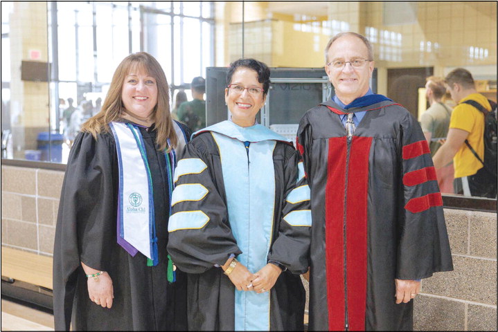 OBU presented its highest employee awards during Convocation on Aug. 30. Jana VanderTook, from left, received the Meritorious Service Award, Dr. Lyda Murillo Wilbur, associate professor of Spanish, received the Promising Teacher Award and Dr. Tony Yates, professor of science, received the Distinguished Teaching Award. Photo provided by OBU
