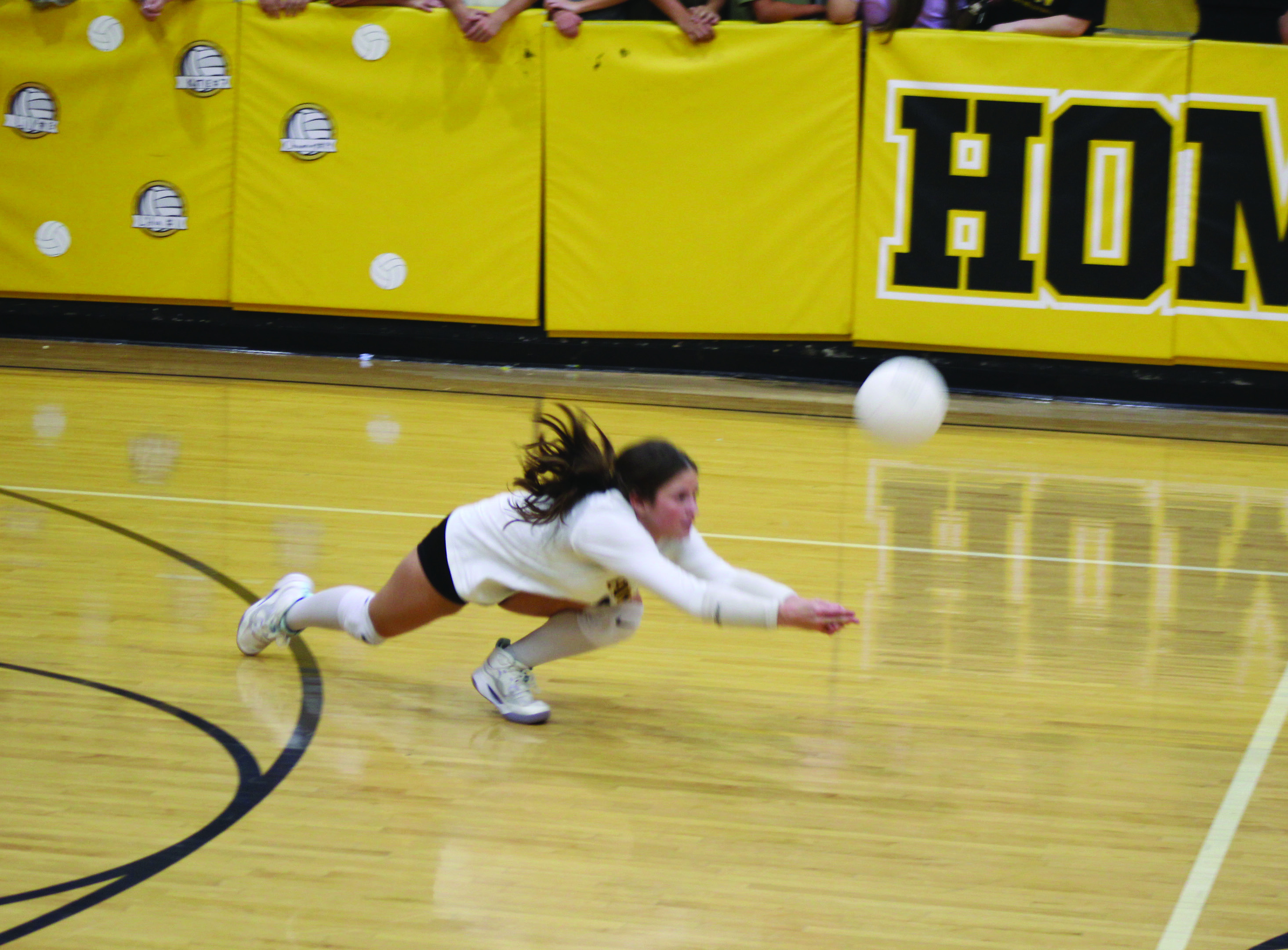 Tecumseh Libero, junior Alexis Sipes, dives trying to keep the ball in play in the Sept. 22 Senior Night home match against Weatherford. The Lady Savages lost 0-3, with sets of 22-25, 23-25 and 19-25. Photos by Natasha Dunagan, Countywide &amp; Sun
