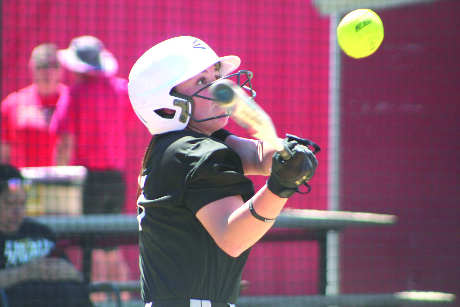 Tecumseh’s Bristin Hayes keeps her eye on the ball before hitting a double in the third inning of the Dale Festival game with Silo on April 13. Held at Dale, the game was won by the Lady Savages, 11-9. Later that day, they lost to Southmoore, 6-10. Games were also played at North Rock Creek and Bethel.