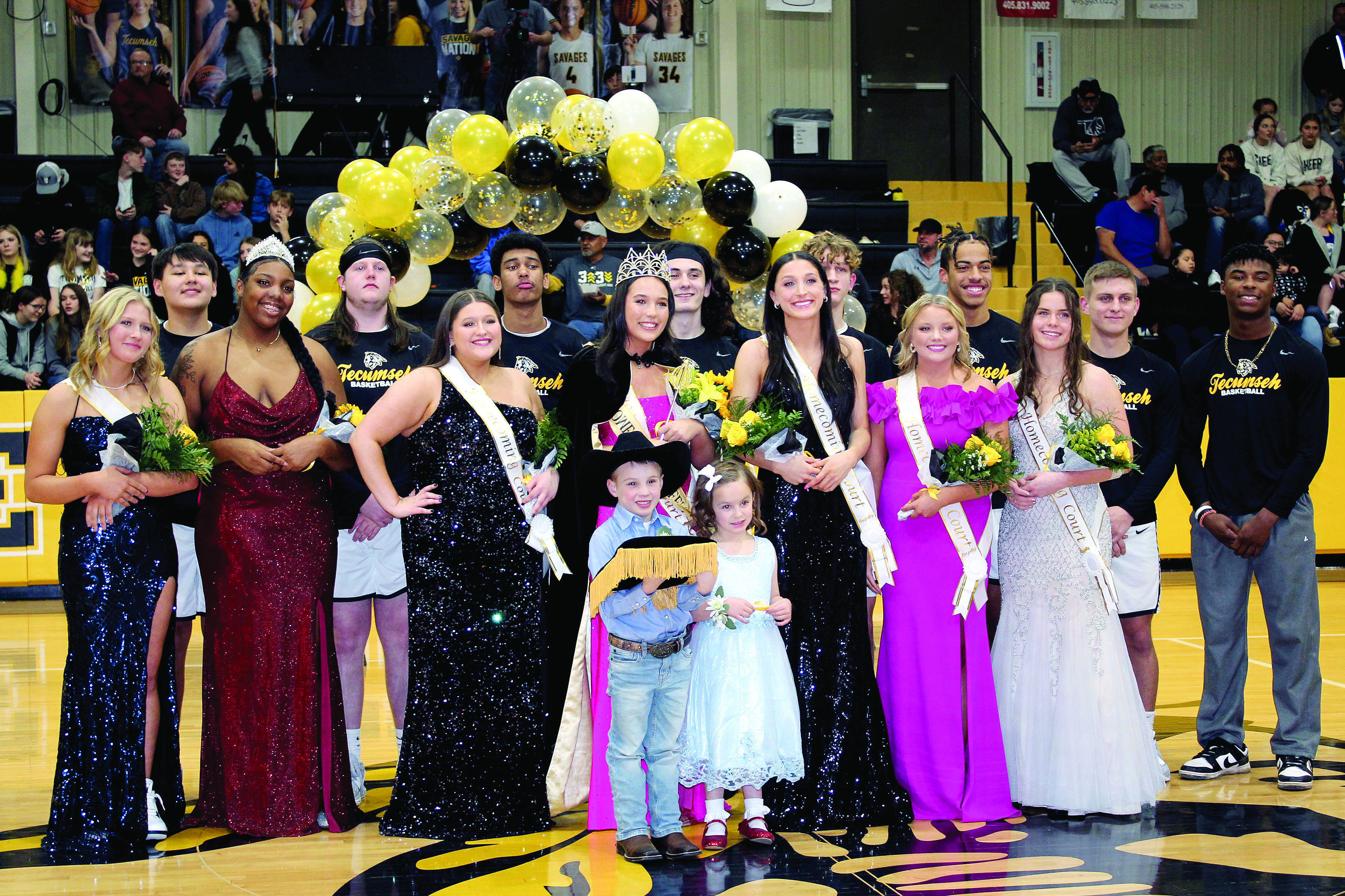 Tecumseh High School held their Basketball Homecoming ceremonies on Feb. 3 and crowned Blakeley Sanchez as Queen. Shown, back row, are sophomore Jackson Martin, Kenny Hatcher, junior Jase Edwards, junior Macen McKiddy, freshman Kohen Warden, junior Marquan Krush, senior Brady Overstreet, and Shaun Hill; middle row, are freshman Steeli Mitchell, 2022 Queen Chantel Evans, junior Zoie Roller, Sanchez, senior Kenzli Warden, senior Cadence Oliver, sophomore Katie Overstreet, front, Micah McLain & Rhemi Speers.