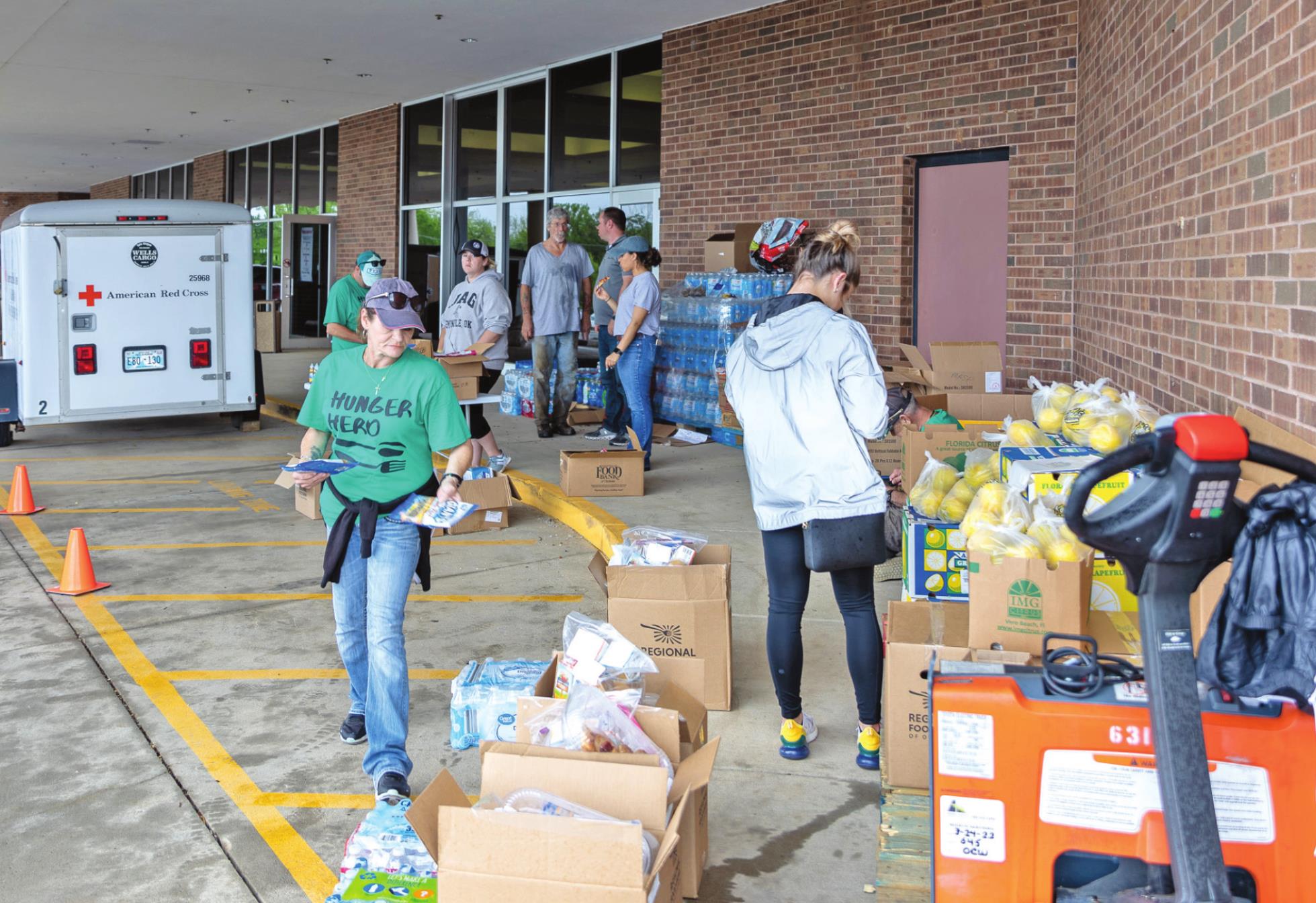 American Red Cross volunteers unload supplies for the relief effort outside the Enoch Kelly Haney Center on the SSC campus on May 5. Photo provided by Seminole State College