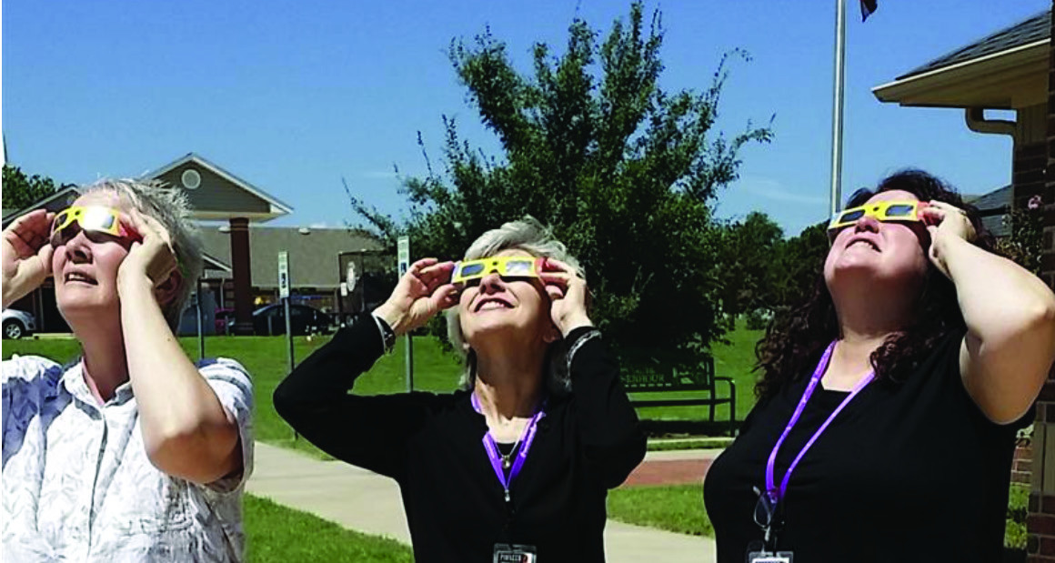 Blanchard Public Library staff view the August 2017 eclipse. Photo provided by Pioneer Library System