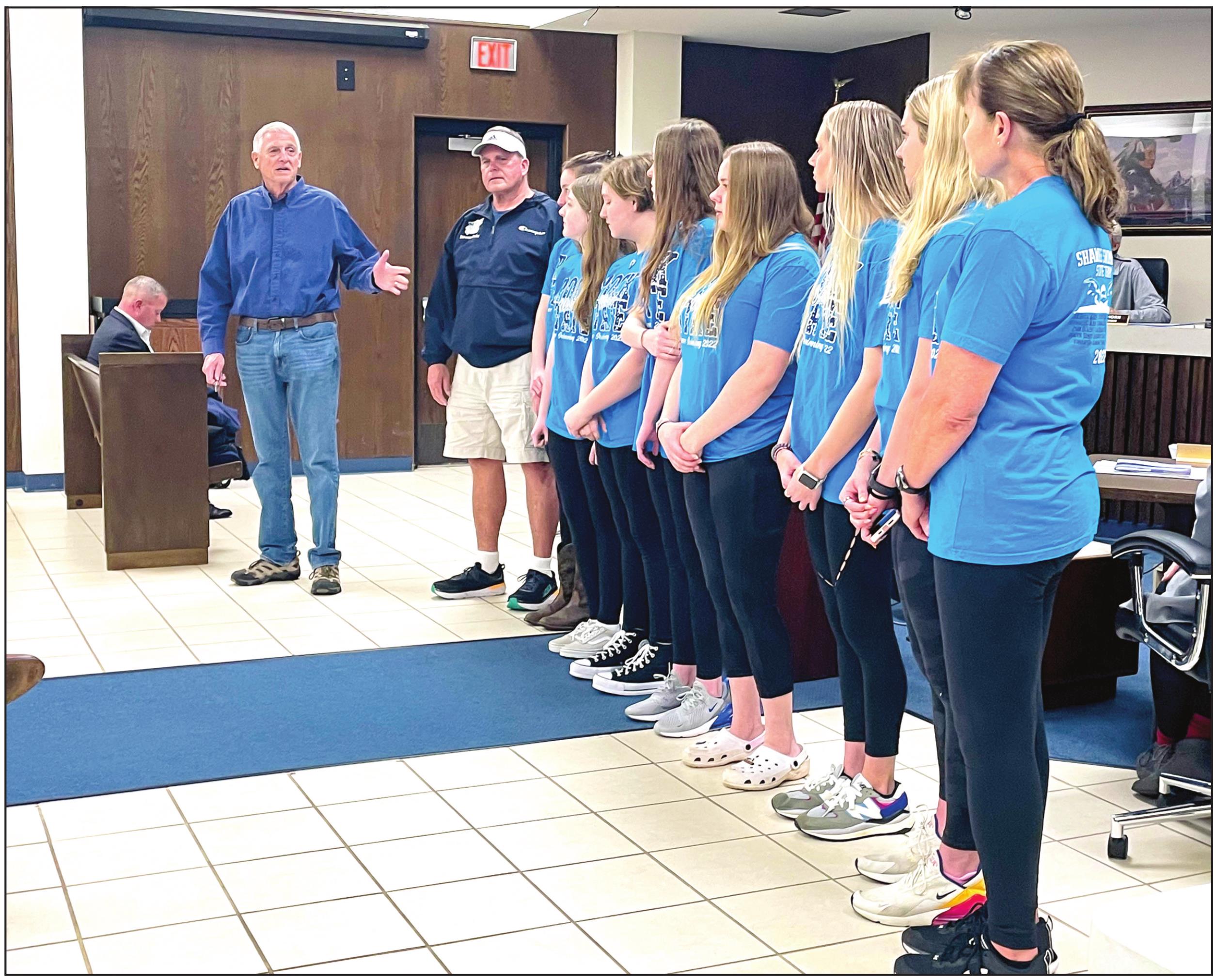 Mayor Ed Bolt introduces Shawnee High School Women’s Swim Team. The team was also presented a certificate in honor of their State Championship win during the Shawnee City Commission meeting held Monday, Mar. 21.