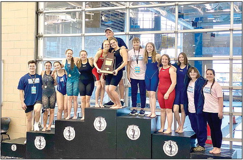 The Shawnee High School Girls Swim Team won the Class 5A State Championship Meet, Feb. 17-18, as well as several individual events. Shown, from left, are Team Manager Trent Ogden, Ashley McDonald, Harlee Bullard, Gracyn Simpson, McKayla Tinkle, Natalie Selman & Piper McNeil (holding trophy) Assistant Coach Bob McNeil, standing behind them, Head Coach Valarie Colburn, Clara Timmons, Emma Oller, Tenielle Kidd, Kelly Templeton, and Jadelyn Shotts. Photo provided.