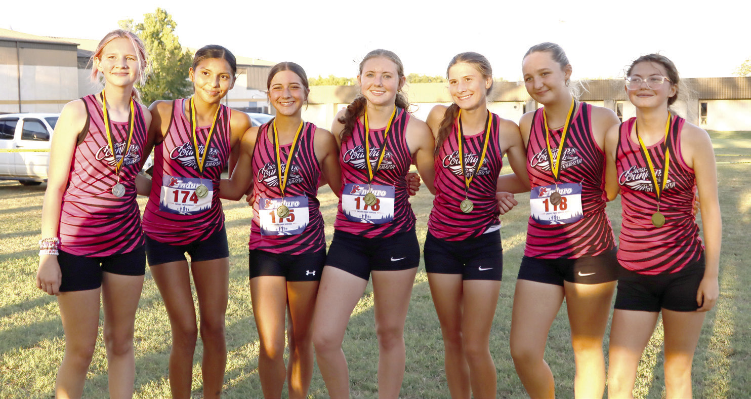 The Tecumseh Cross Country Lady Savages competed at the Savage Cross Country Invitational at Tecumseh High School on Sept. 22. Shown, from left, are Brynna Walker, 18th place; Livia Four Horns, eighth place; Bree Mitchell, seventh place; Allison Walker, first place; Sosi Mitchell, second place; Anna Harvey, 21st place; and, Kate Pearcy, sixth place. Photos courtesy of Amiah Vermillion, THS student