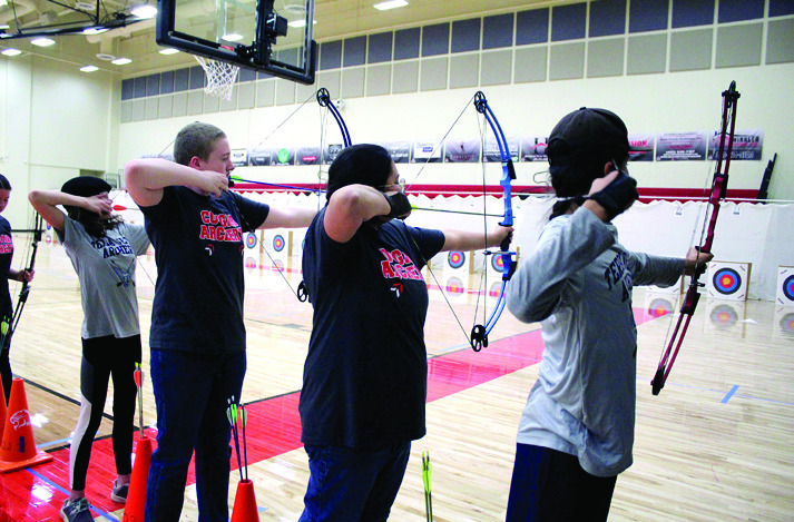 North Rock Creek students Braden Hibler and Callie Haney, second and third from left, compete in the NASP Tournament, held at NRC Jan. 13-14. Countywide &amp; Sun/ Natasha Dunagan