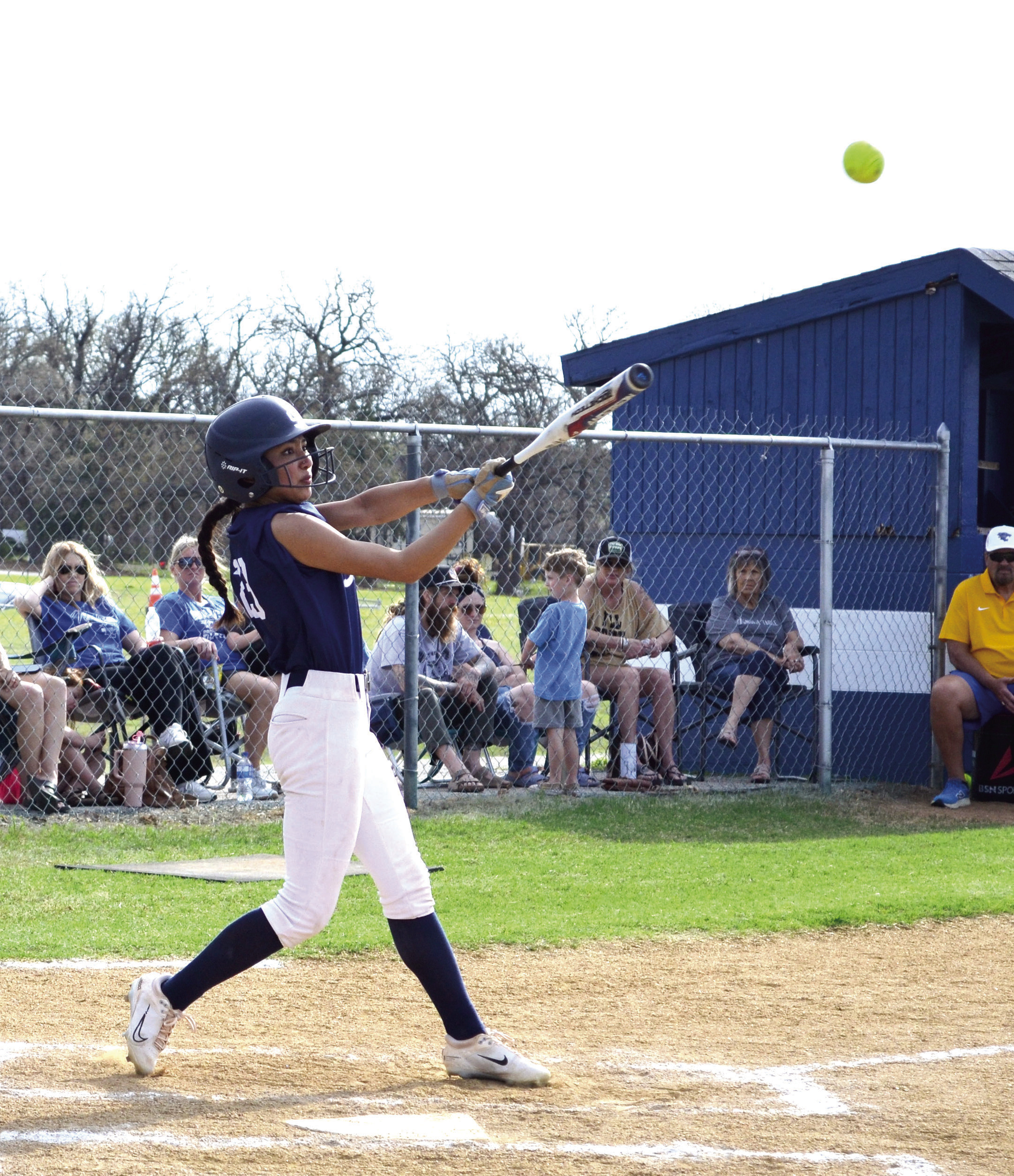 Shawnee's Alivia Grass takes her turn batting the ball during the March 27 game against Bethel. Jessica Jones, Tecumseh High School Intern, Countywide & Sun