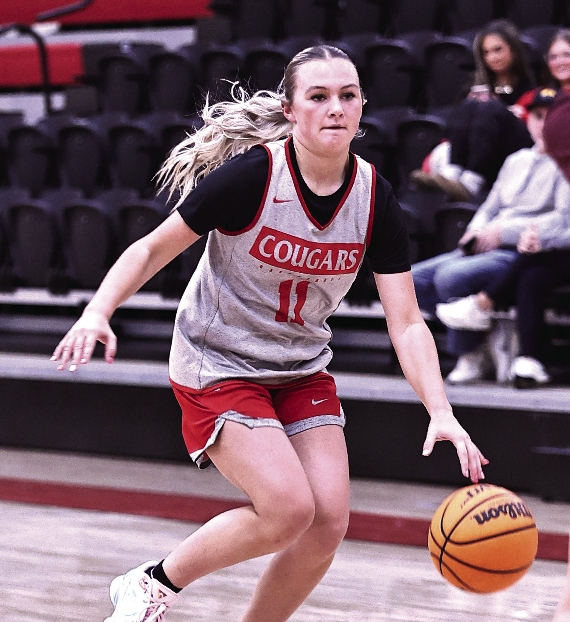 North Rock Creek’s Aubree Shivelhood brings the ball up court. Photo courtesy of Gowin Photography