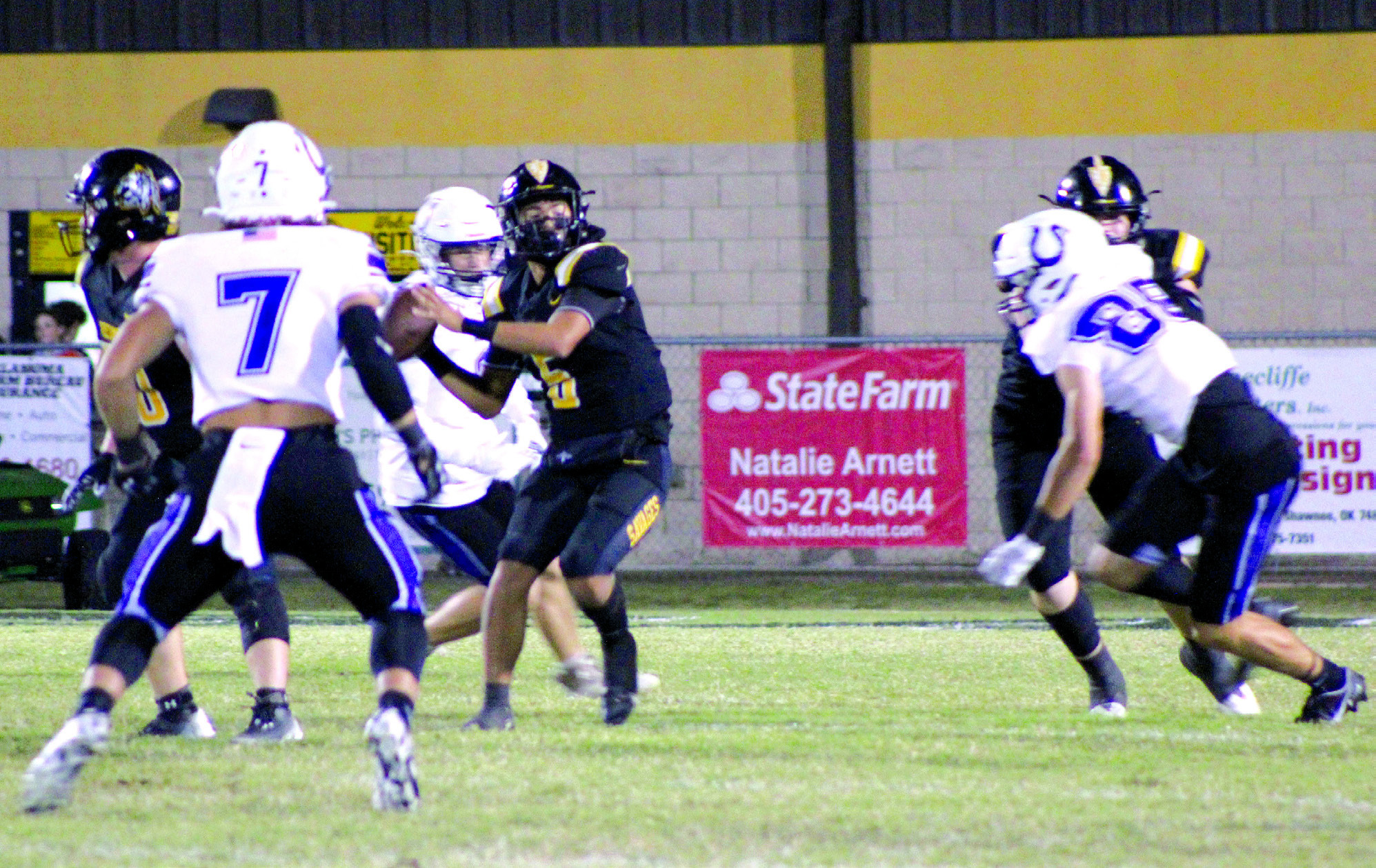Tecumseh sophomore Maddox Dickson looks to pass during the home game with Bethany, Oct. 12. The Savages lost, 14-49. Countywide & Sun/Natasha Dunagan