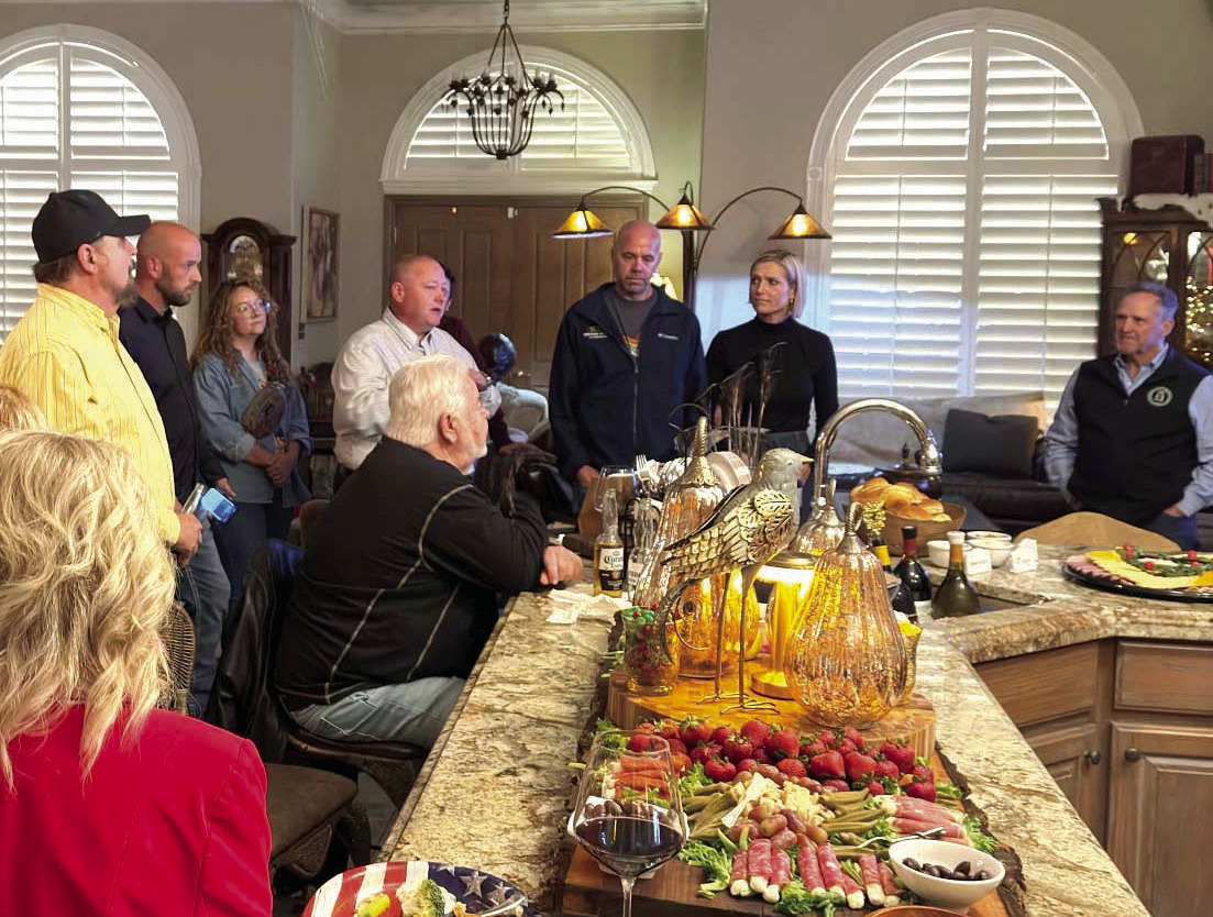 Dist. 26 State Rep. Dell Kerbs, surrounded by friends and supporters, thanks the hosts and those who attended the watch party held in Shawnee Tuesday night after winning his run for another term in office. Photo provided