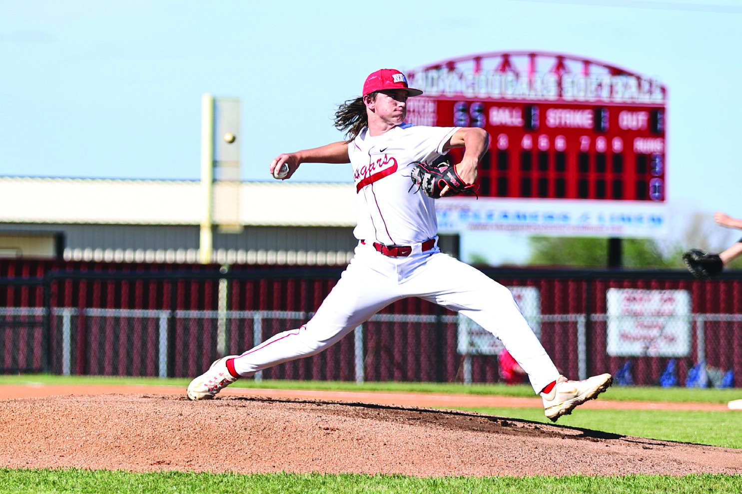 North Rock Creek’s Landon Kelough puts everything into the pitch. NRC Beat Henryett 10-0 and Kelough was the winning pitcher.