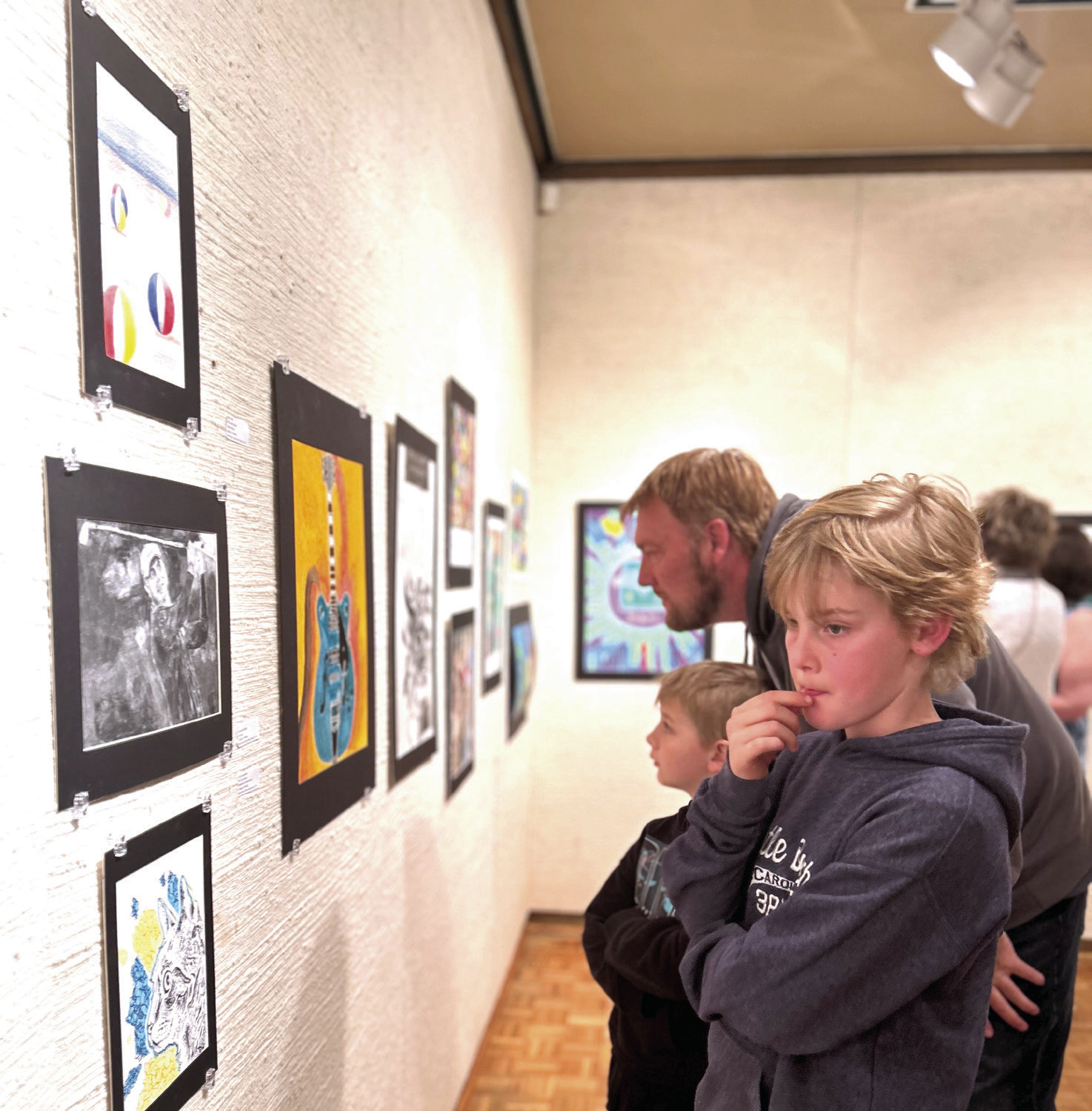 Gerrer Museum of Art. The annual exhibition will be on display from Mar. 1-30 and the opening reception will be on Mar. 2 at 5 pm. Photo provided by MGMoA Visitors tour the Annual High School Juried Art Exhibition at the Mabee-
