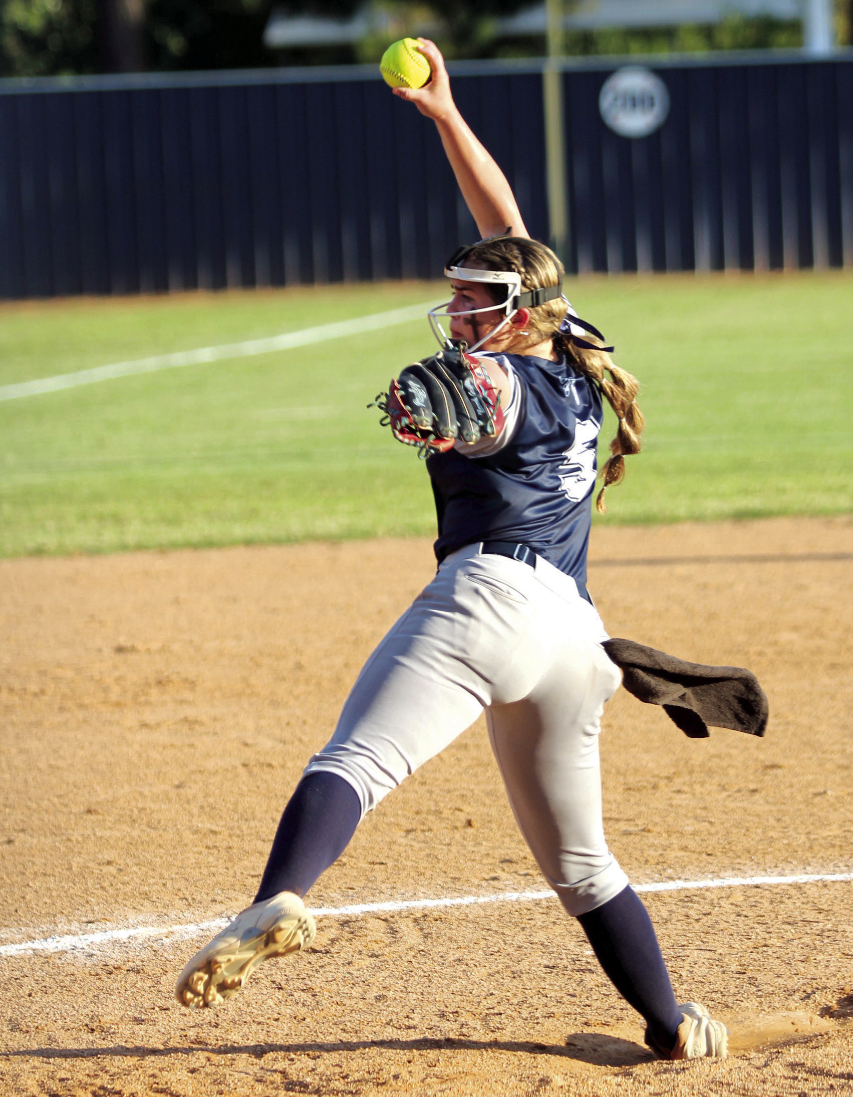 Asher freshman Nevaeh Griffin winds up her pitch in the third inning of the game against Tupelo.