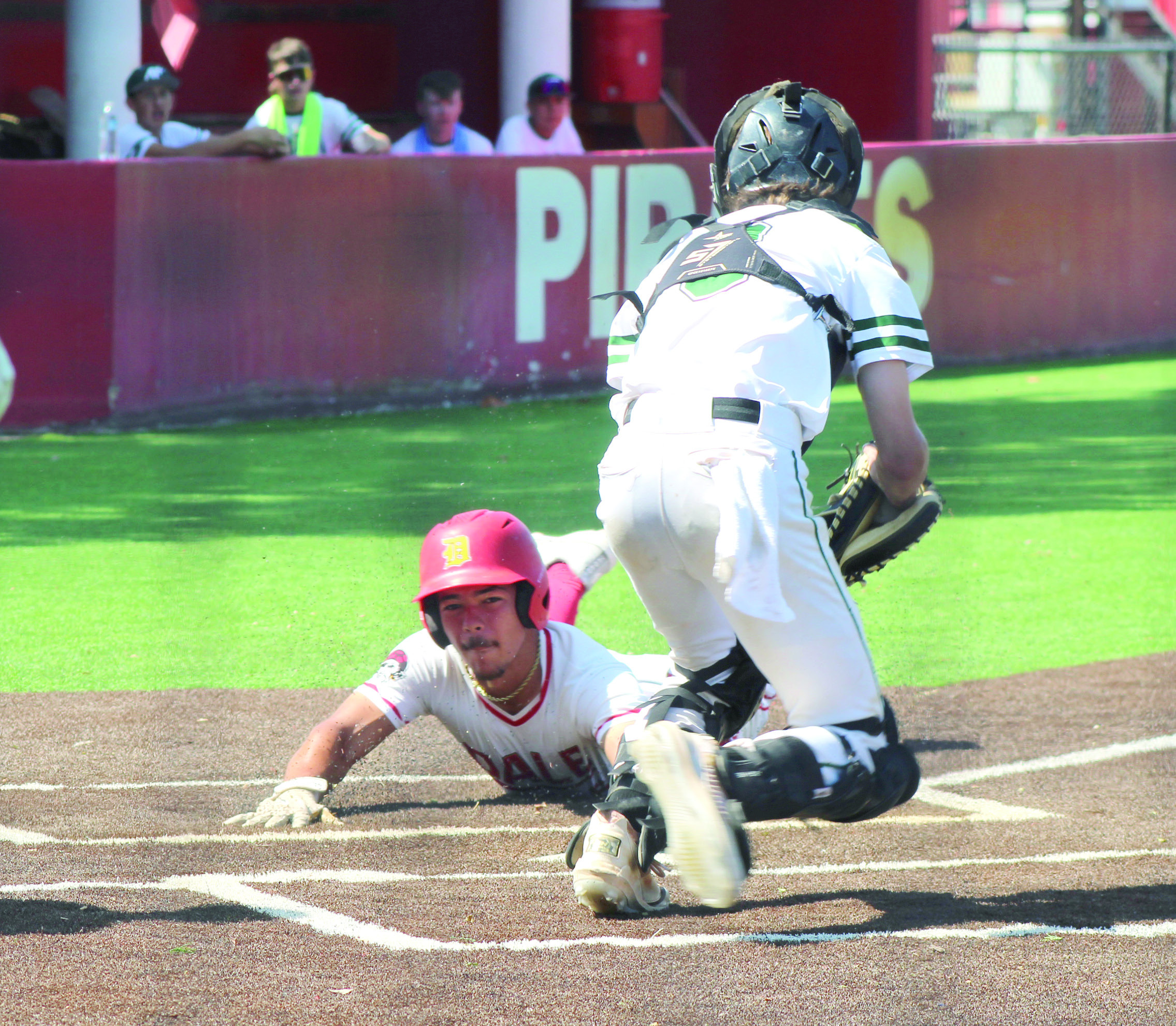 Dale senior Braylon White dives safely home as an RBI in the second inning of the Aug. 13 home game against Amber-Pocasset during the Dale Baseball Tournament. The Pirates won this game, 13-1; lost against Fort Cobb-Broxton on Aug. 14, 9-11; and bounced back for a win against Preston on Aug. 15, 8-6. Also, Dale had a ribbon-cutting for their newly turfed baseball field on Aug. 13. Photos by Natasha Dunagan, Countywide & Sun